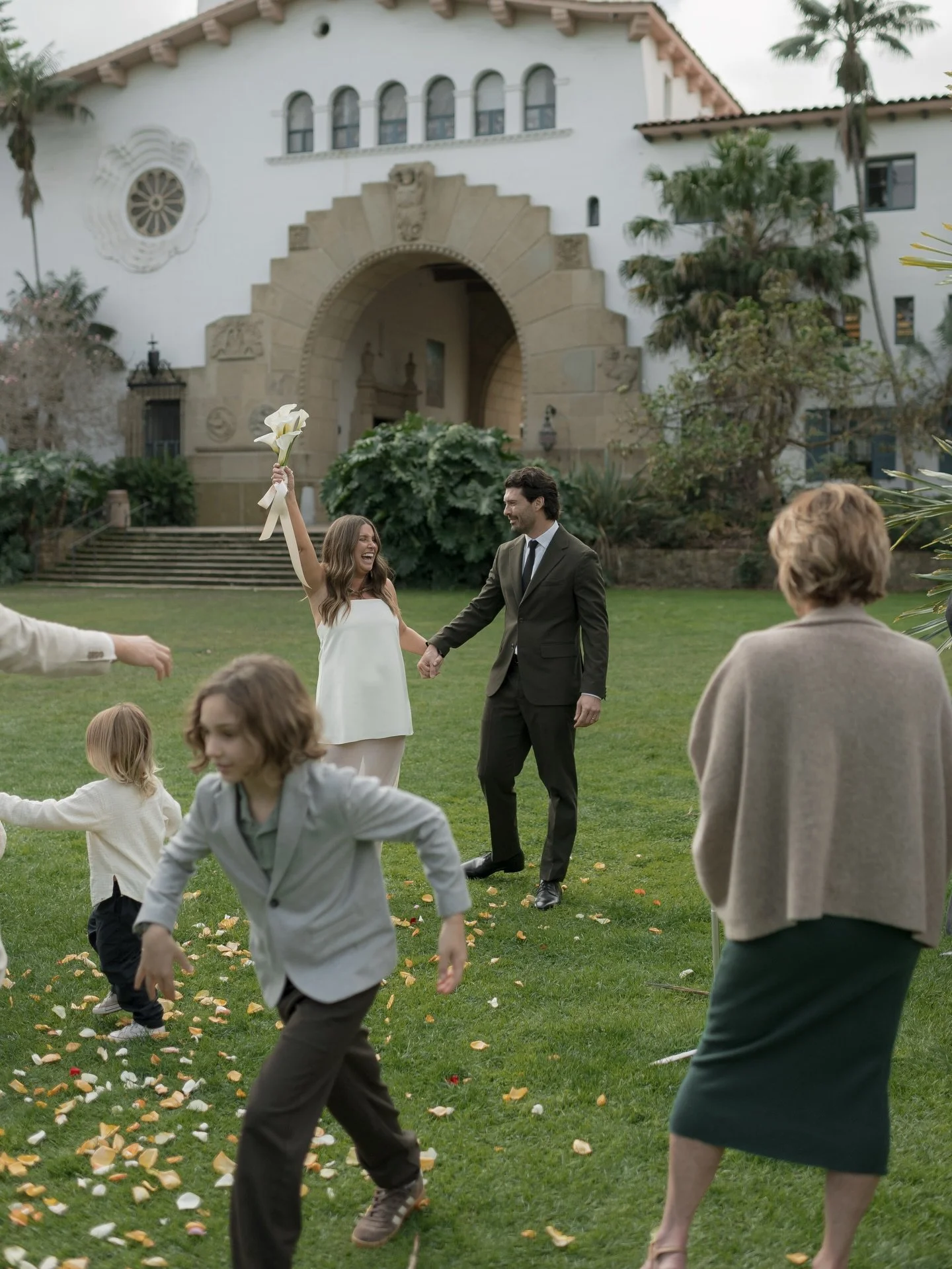 Started the year with this beautiful elopement celebration for Megan &amp; Harris at the courthouse🤎🎞️ and their precious baby girl Lily, who was just two weeks old. Their first photos as a family of three! 
.
.
.
.
.
.
.
.
#santabarbaracourthouse 