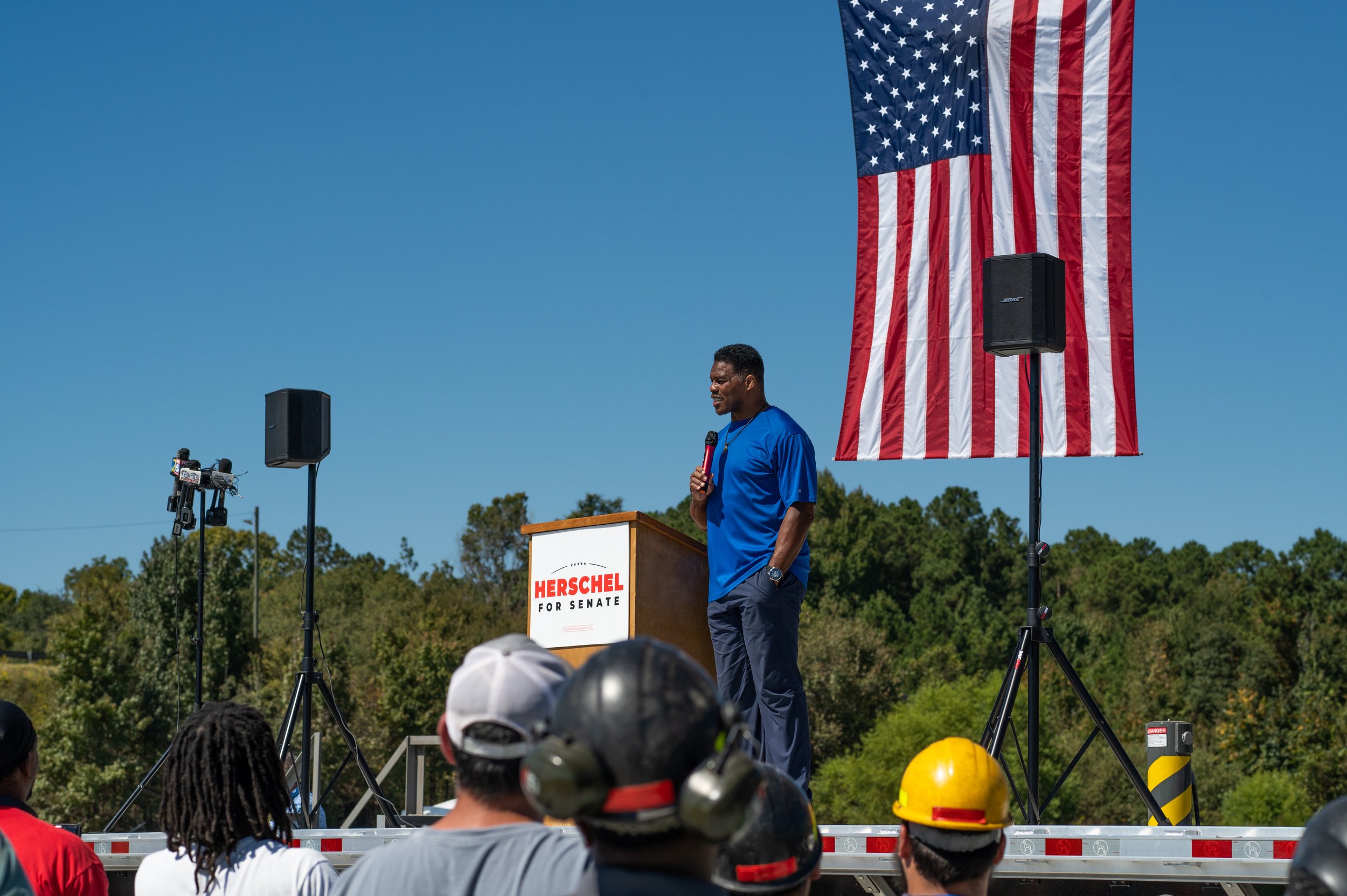 Herschel Walker speaking at rally in Wadley, GA before the 2022 Georgia midterm election for The New York Times.
