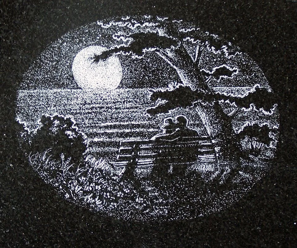 Silhouette of a couple sitting on a bench under a tree, with a full moon and stars illuminating a serene nighttime scene over water.