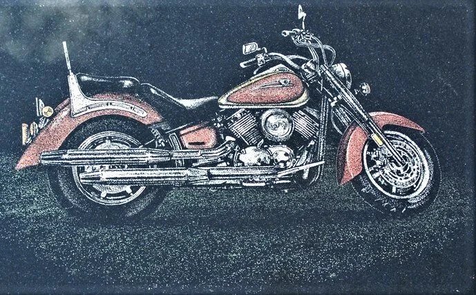 Vintage red motorcycle illustration with detailed chrome features against a dark background.