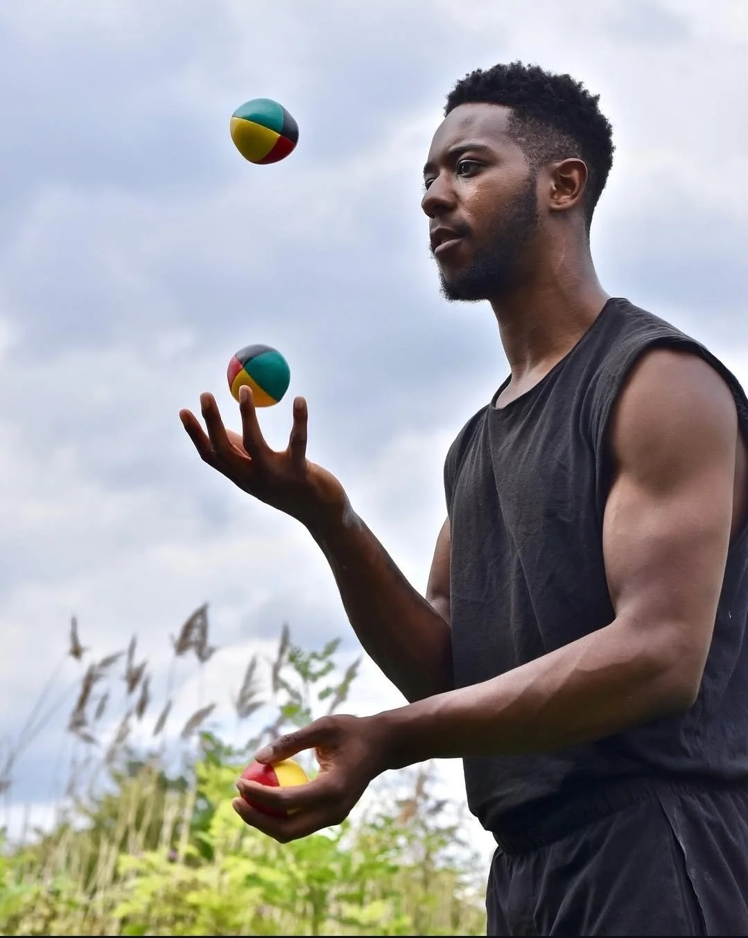 Photo of Micah Campbell juggling