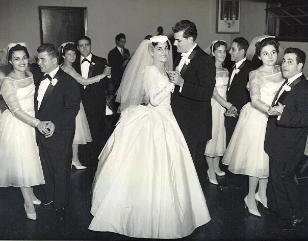 photograph of a bridal party dancing in the 1950s