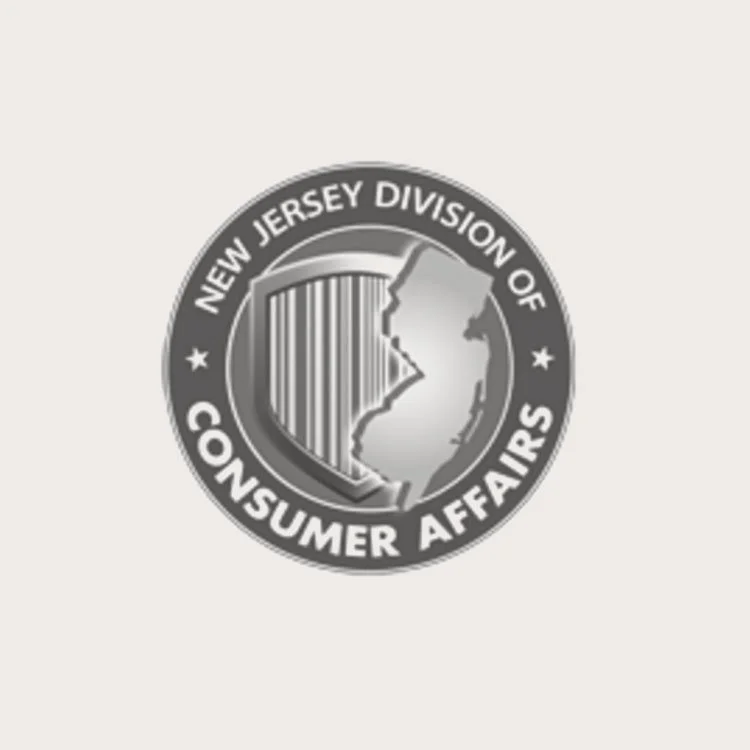Gray circular logo with the text 'New Jersey Division of Consumer Affairs' around the edge and an outline map of New Jersey in the center.
