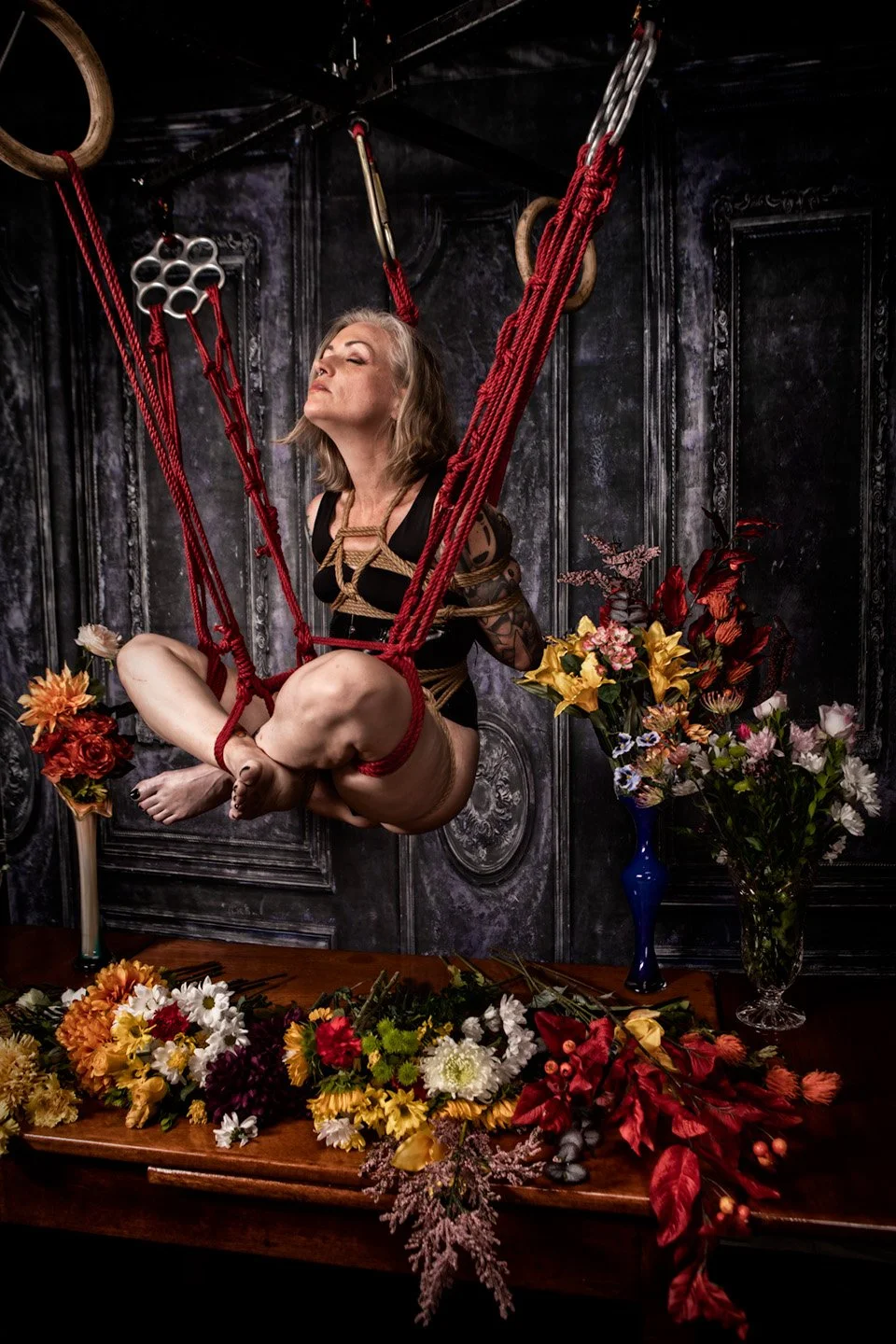 Seated Suspension over Flowers