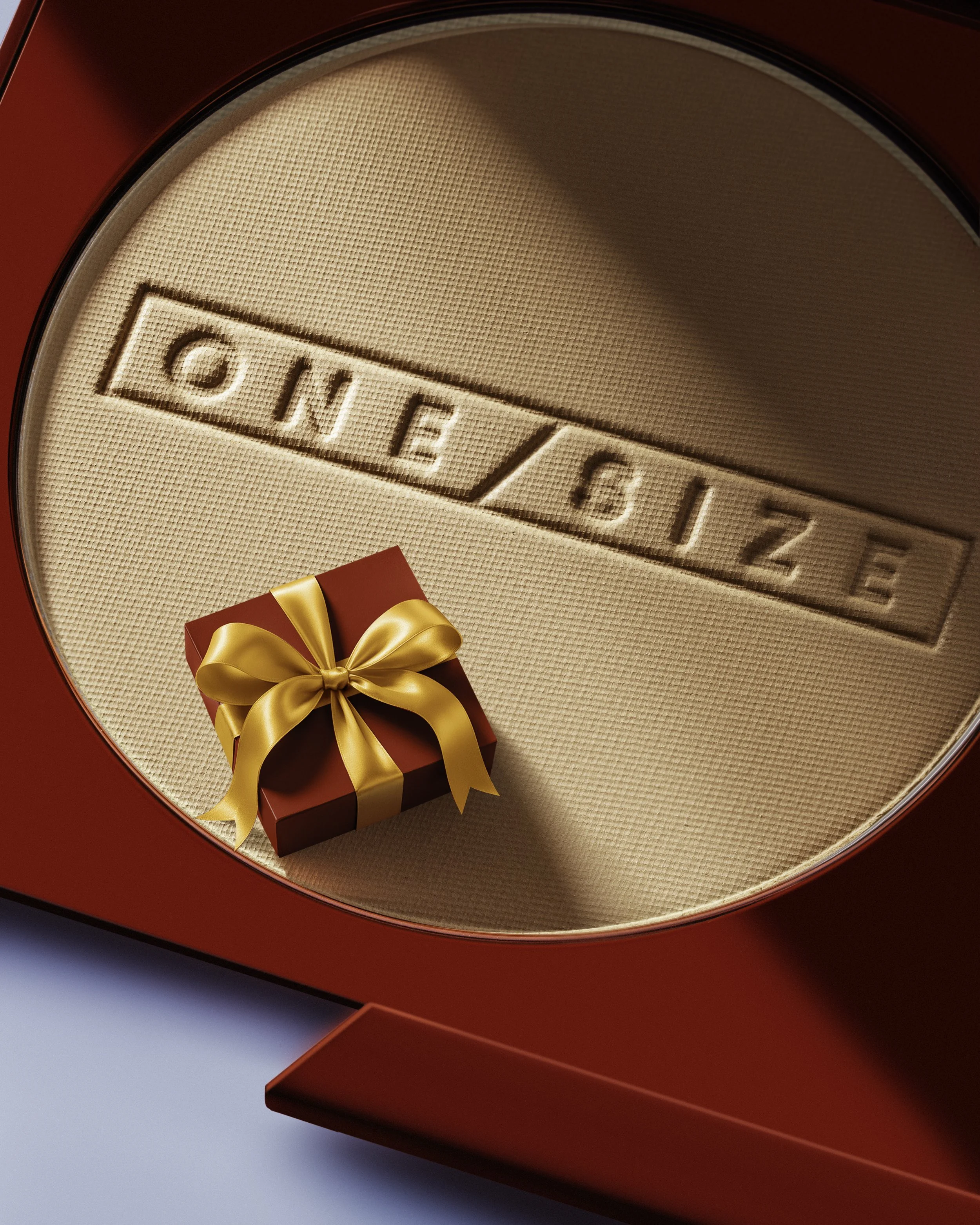 A heart-shaped jewelry box with the brand name ONESIZE embossed on the inside lining, containing a small red gift box wrapped with a gold ribbon.