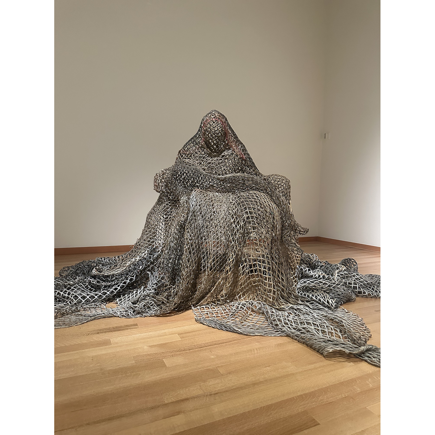 Mia Feuer
“My Pieta”, 
sculpture made entirely 
from discarded hockey nets 
and resin, 2025, 72˝ x 60˝ x 60˝