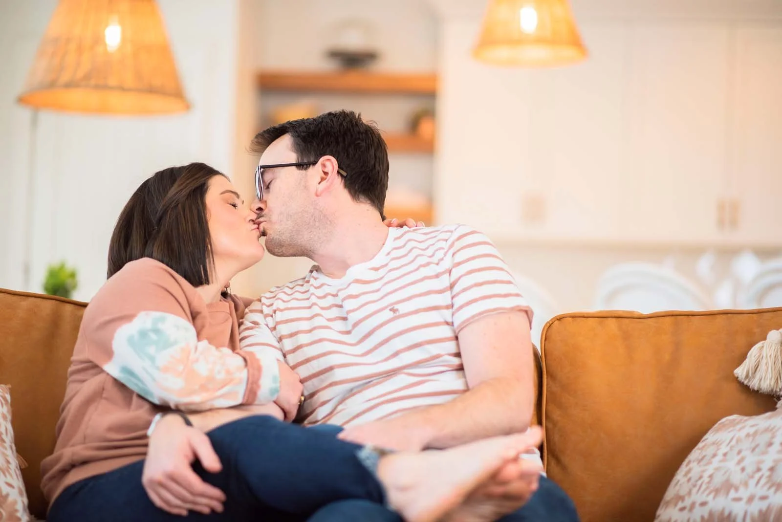 Couple-Indoor-Photosession-Kissing-pinks-oranges-Nampa-Idaho-Candid-Married-home.jpg