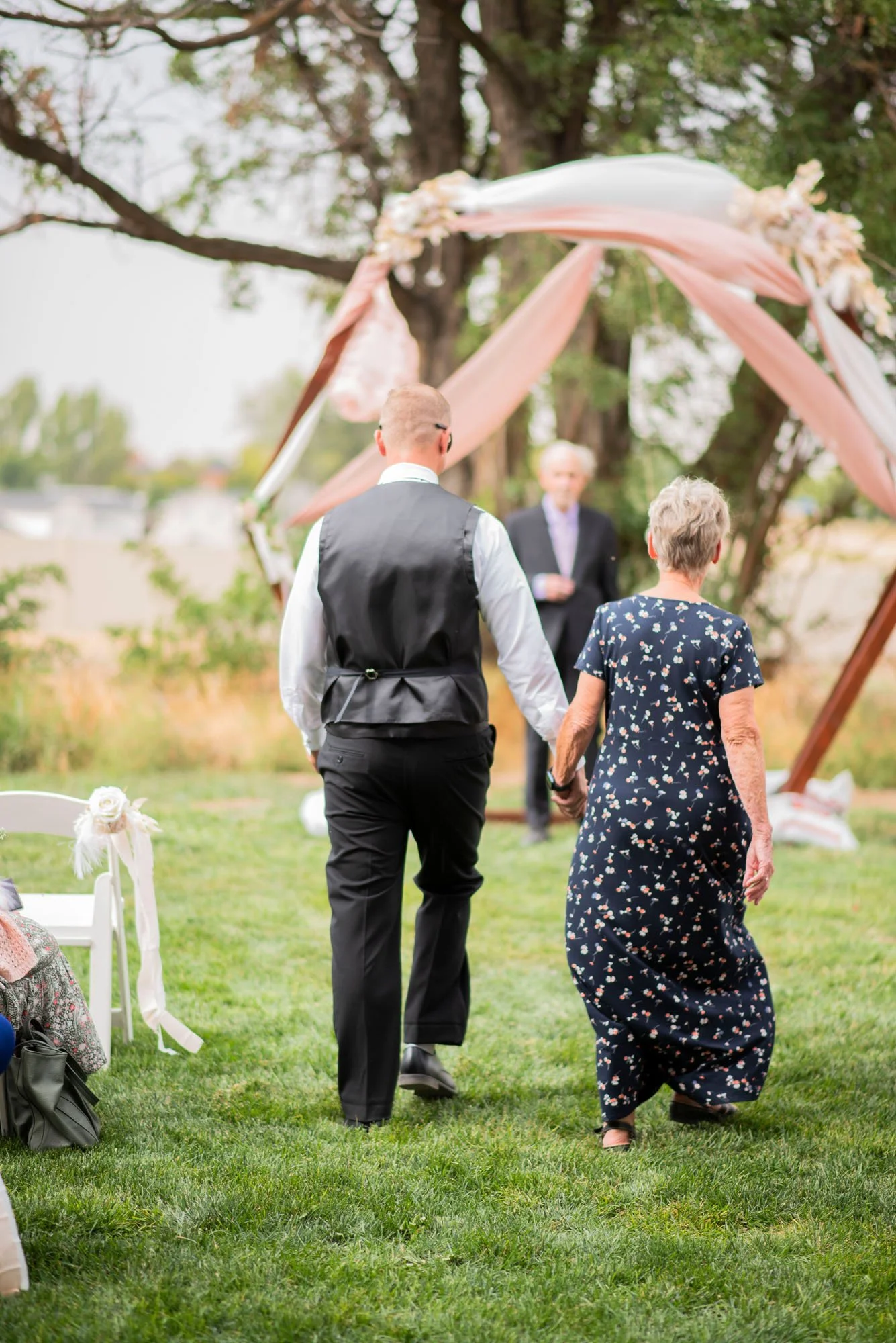 Firefly-Ranch-Idaho-Venue-Nampa-wedding-Ceremony-mother-son-walk.jpg