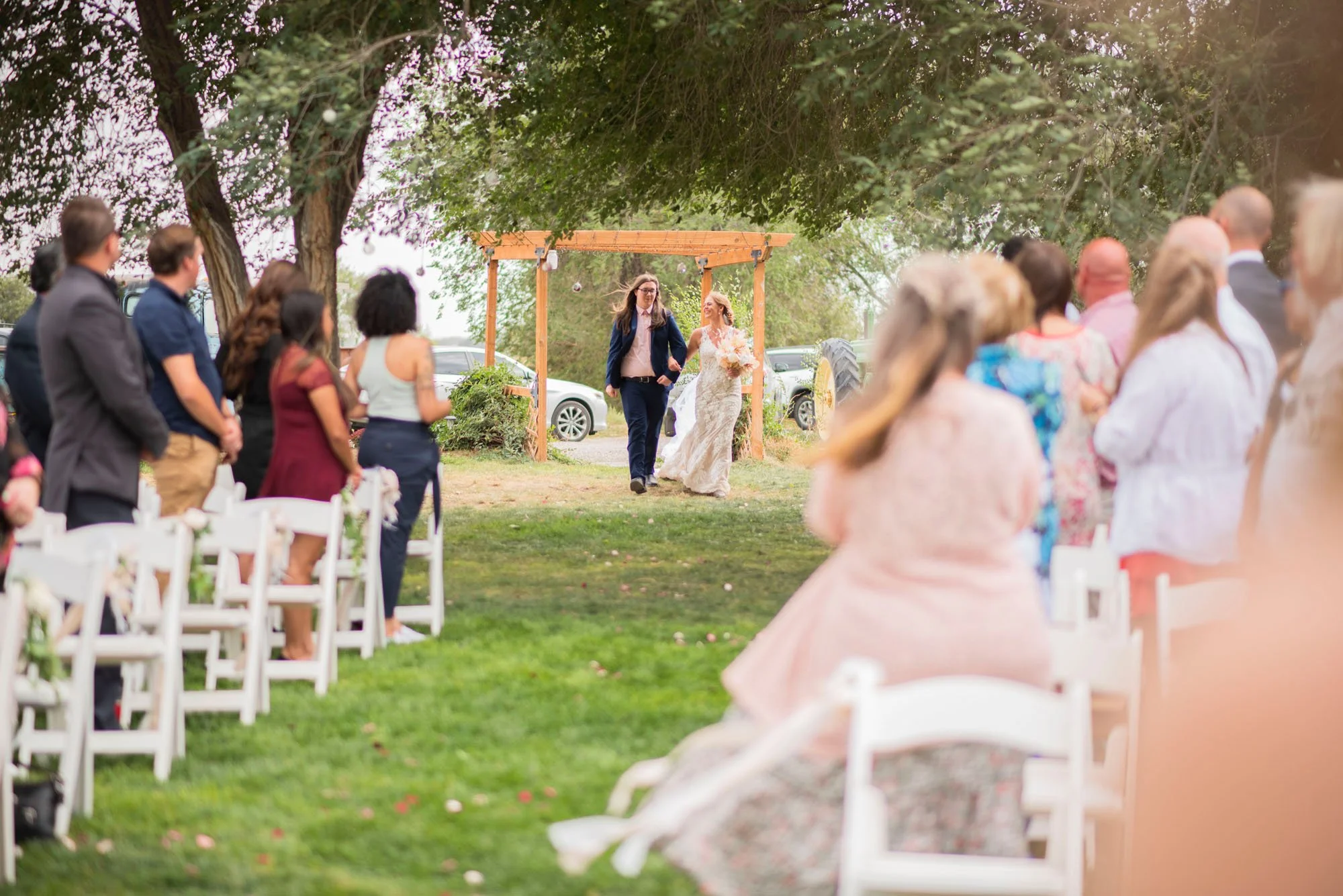 Firefly-Ranch-Idaho-Venue-Nampa-wedding-Ceremony-Outdoors-down-isle.jpg