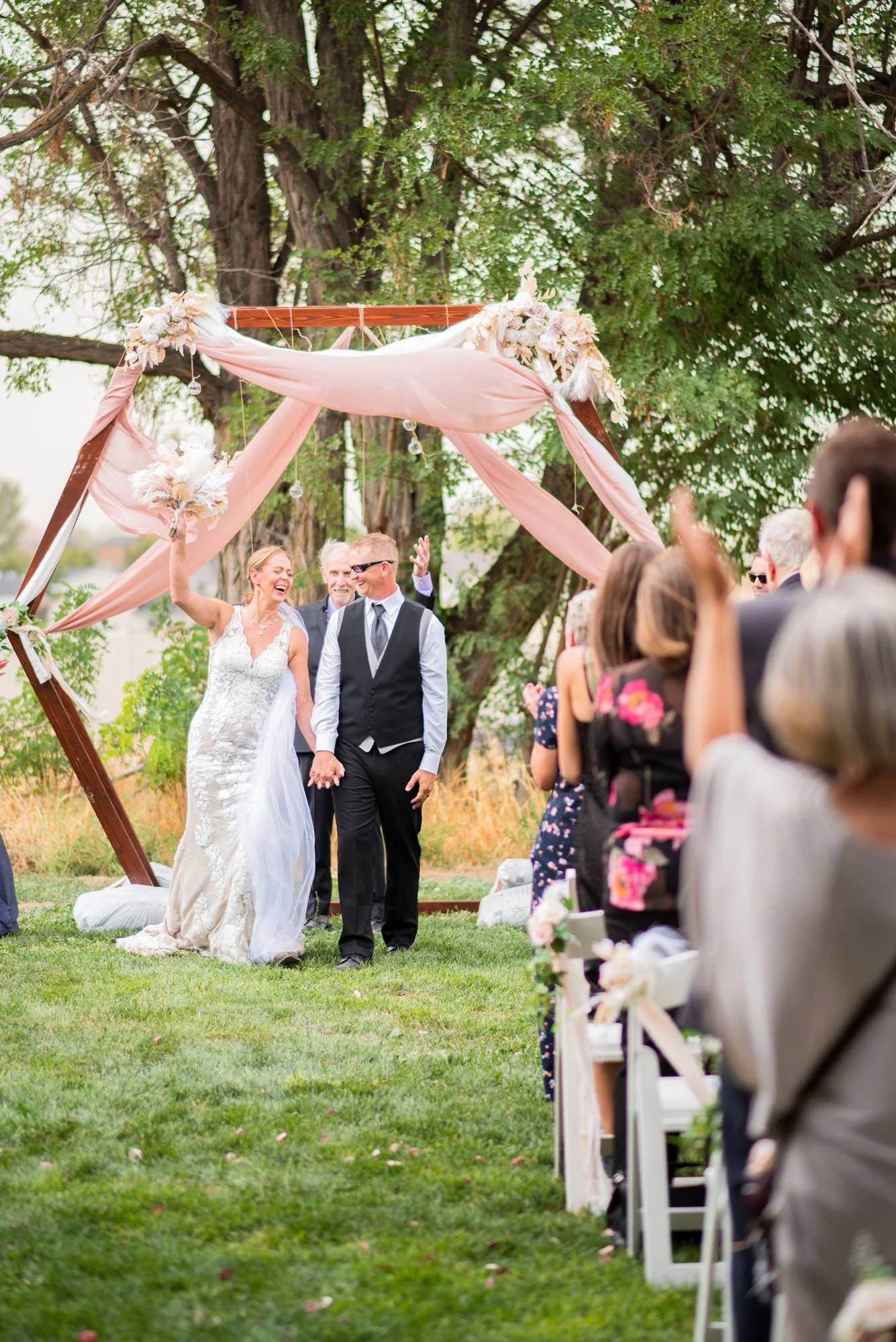 Firefly-Ranch-Idaho-Venue-Nampa-wedding-Ceremony-Outdoors-married-bouqet.jpg