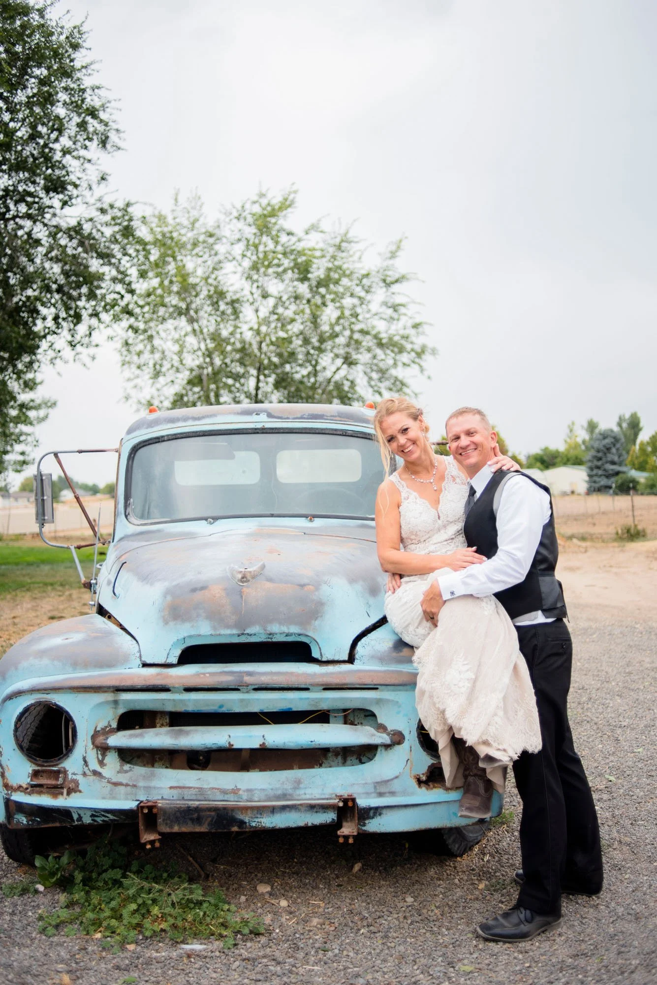 Nampa-Idaho-wedding-Antique-truck-bride-groom-wedding-dress-suit.jpg