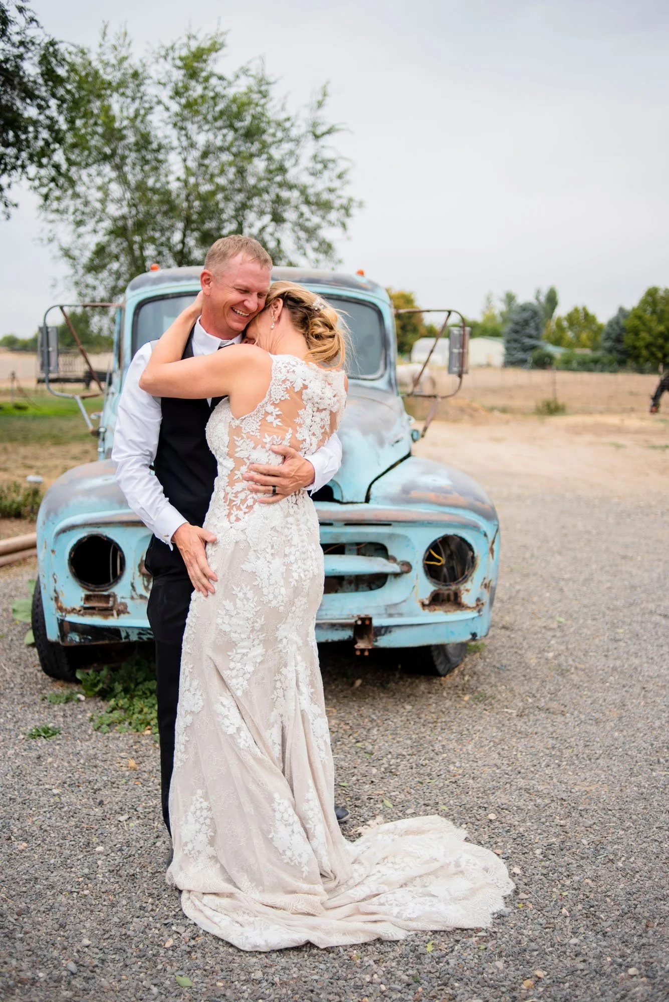 Nampa-Idaho-wedding-Antique-truck-bride-groom-wedding-ring.jpg