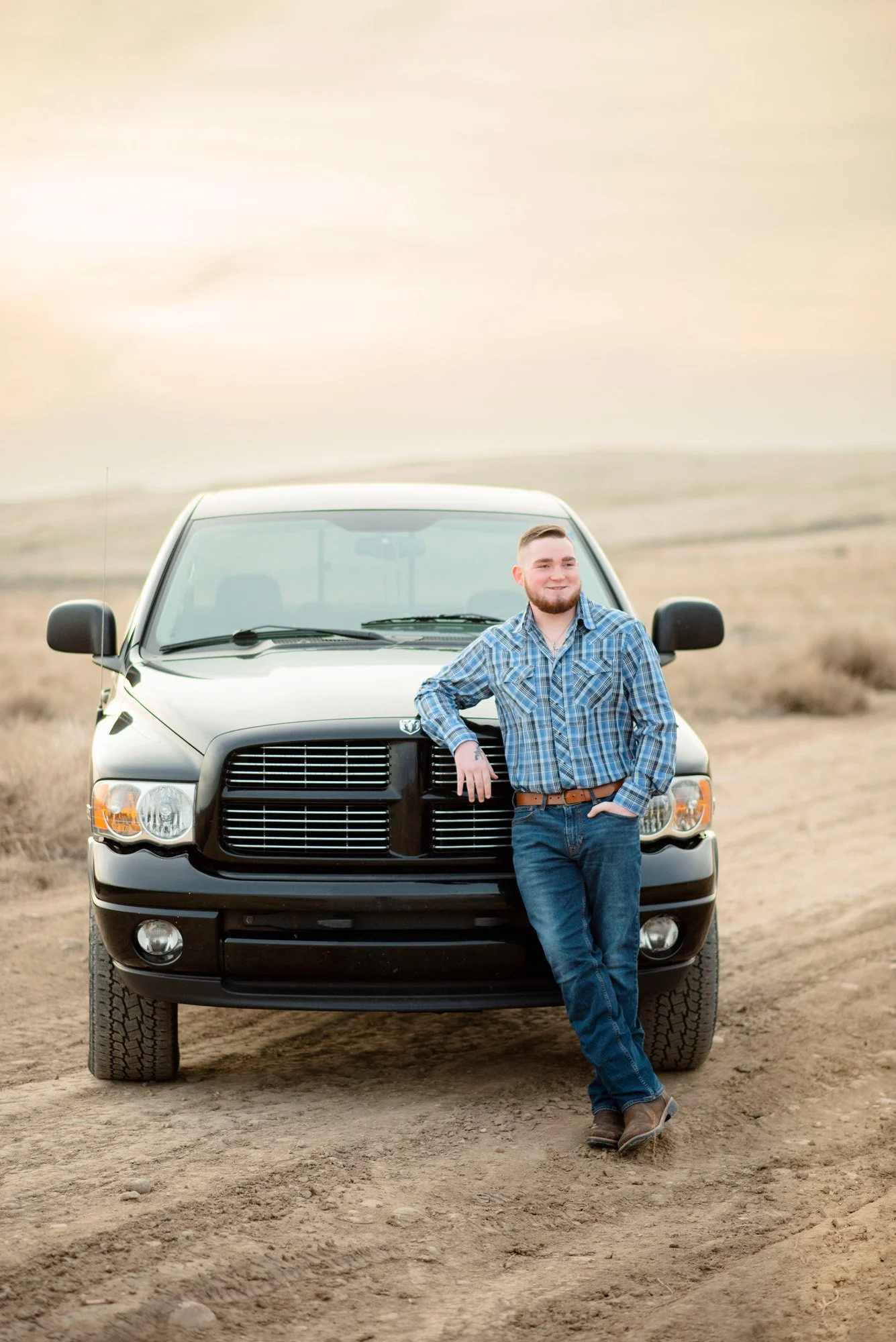 Senior-Portrait-Male-Truck-Nampa-Idaho-Dirt-Road-Dodge-Ram-Western.jpg