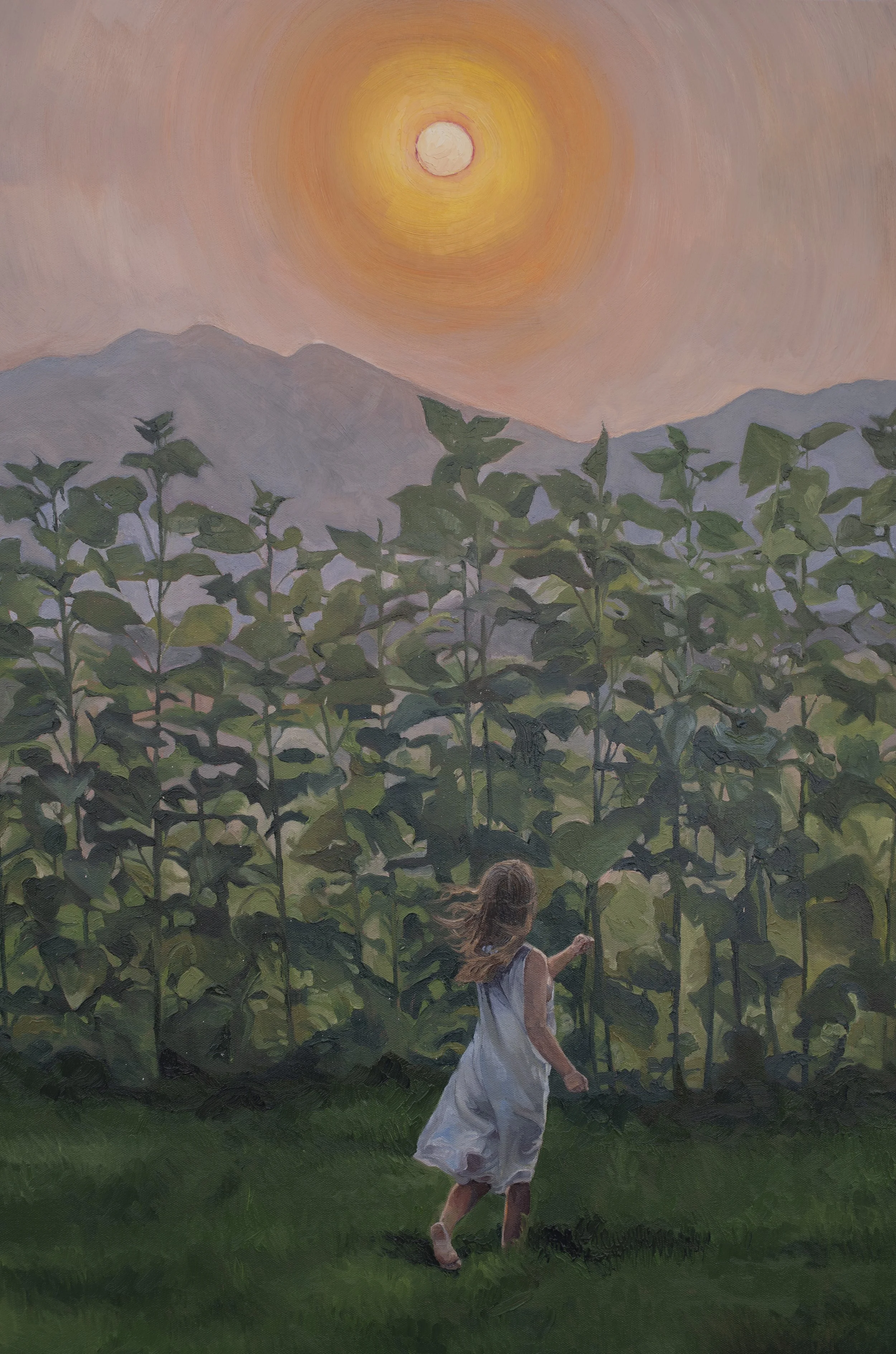 A woman in a white dress running through tall green plants in a field at sunset, with mountains in the background.