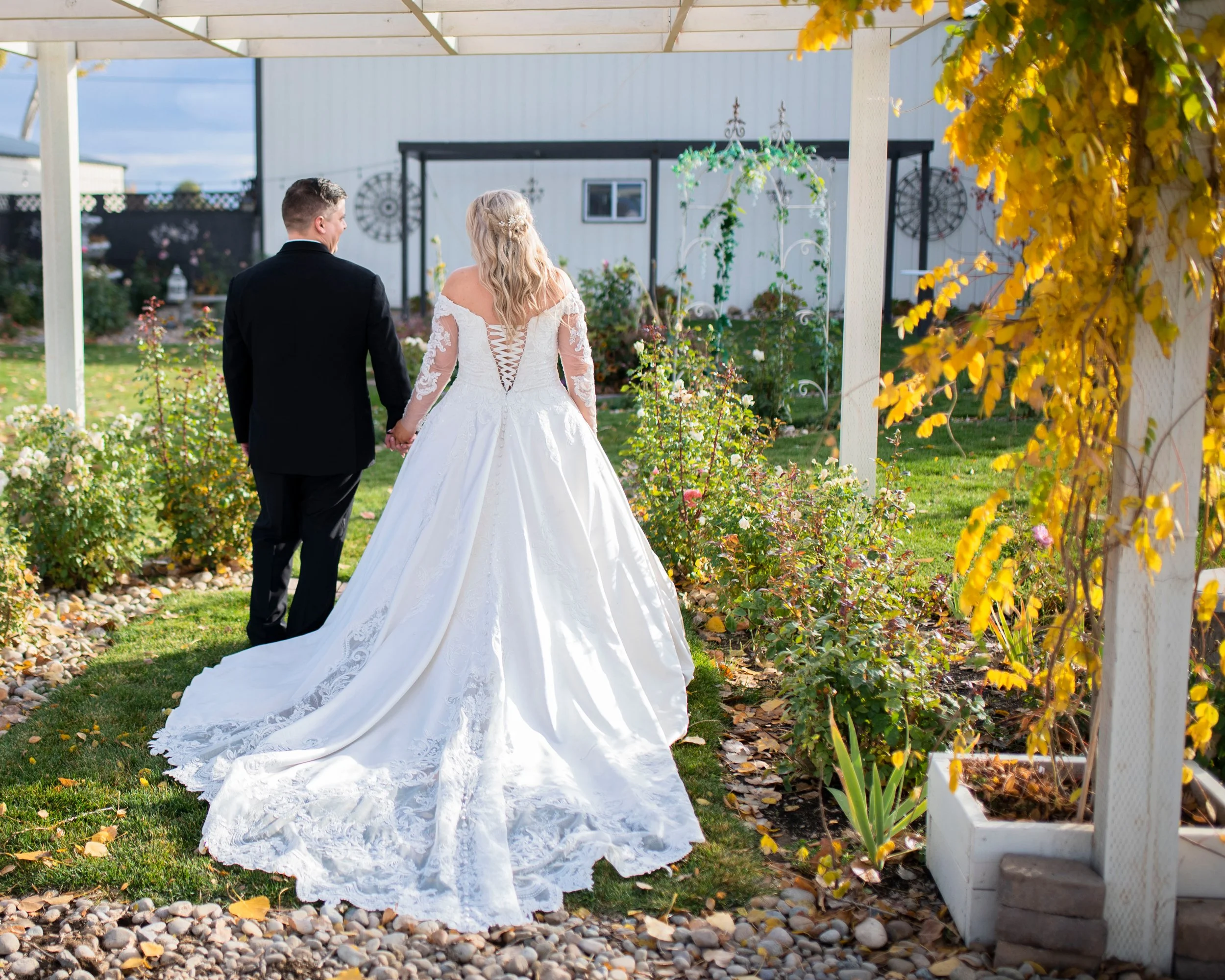 Treasure-Valley-Idaho-Wedding-Nampa-Idaho-Rustic-Gardens-Venue-Ceremony-Walking.jpg