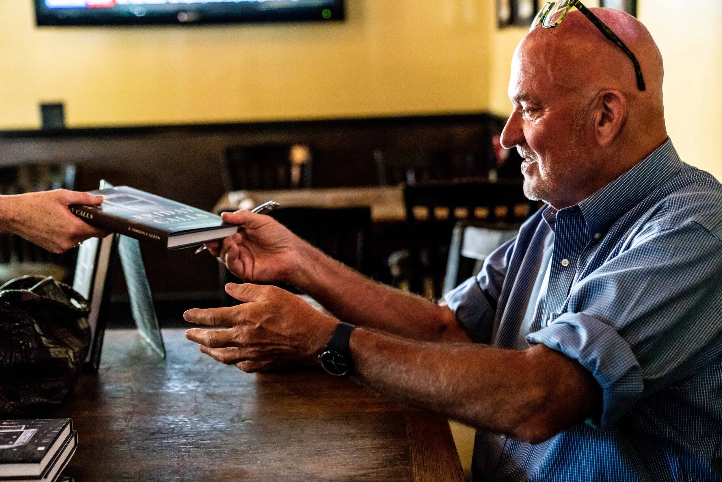  Glenn at a book signing for   Friday Calls   at O’Brion’s Pub in Charleston, SC. Photography by  Matthew Crum .  