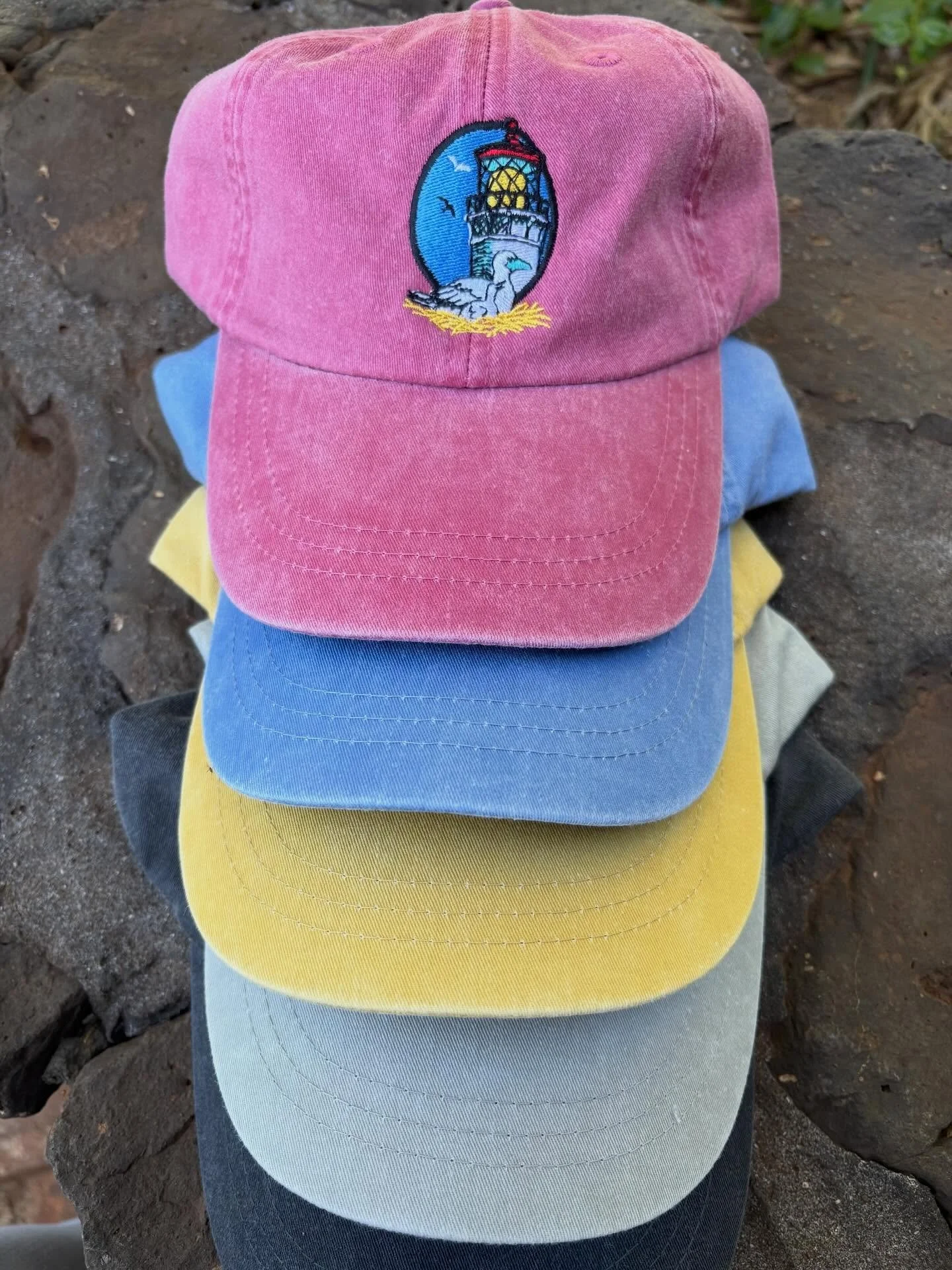&hellip; and they&rsquo;re BACK! 🧢🌈
Our all-cotton Kīlauea Point National Wildlife Refuge custom caps are officially restocked and ready for more adventures.

That perfectly washed, broken-in feel you love ✔️
Custom lighthouse embroidery inspired b