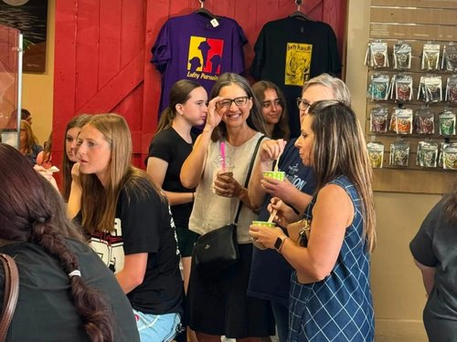 Women of the church greeting one another after worship