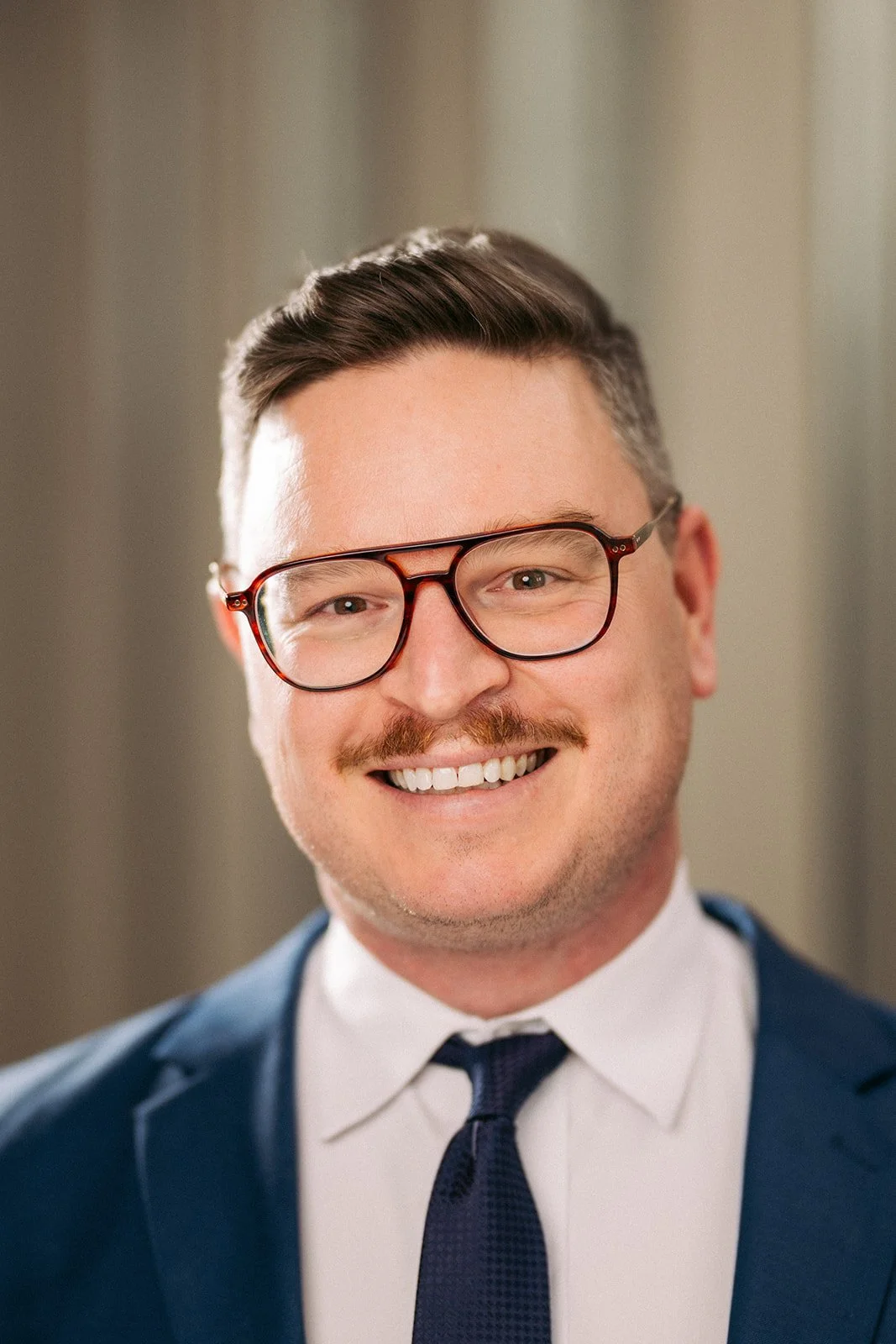 Curtis Tokarchuk,
Senior Director