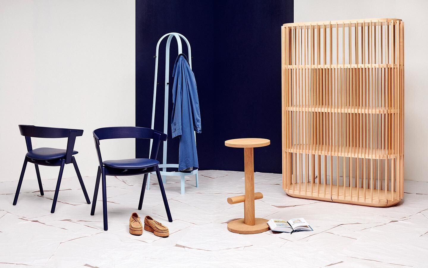 A few favourites of ours designed by @nickrenniehfd The OS1 chair in navy blue with a luxurious matching upholstered seat in @pelleleathers, light blue Rakii coat rack, Perch High stool in Natural US oak and our Rock maple Kooii Cabinet. Beautifully 