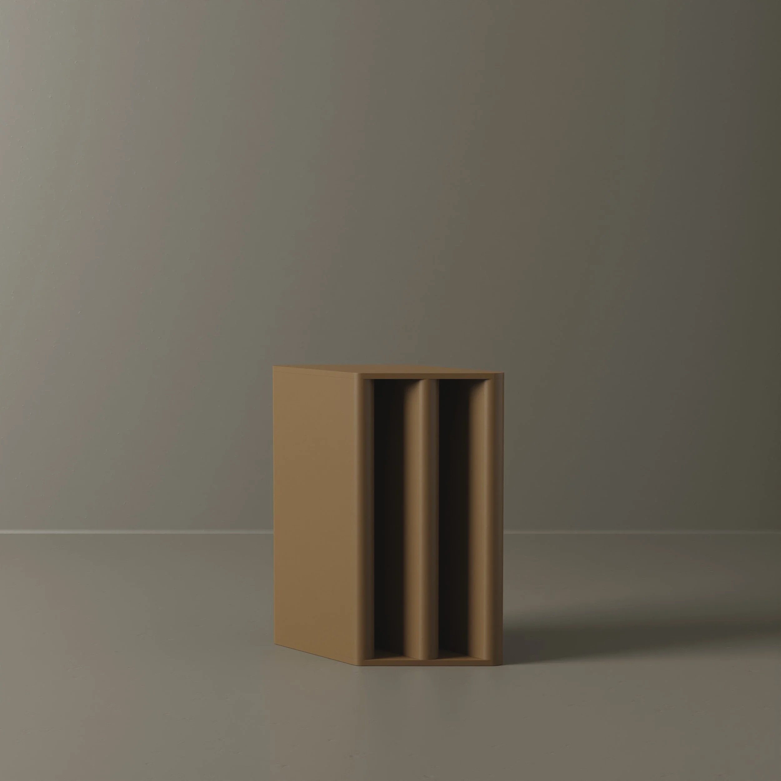 A small wooden side table with three vertical compartments sits on the floor in front of a plain grey wall.