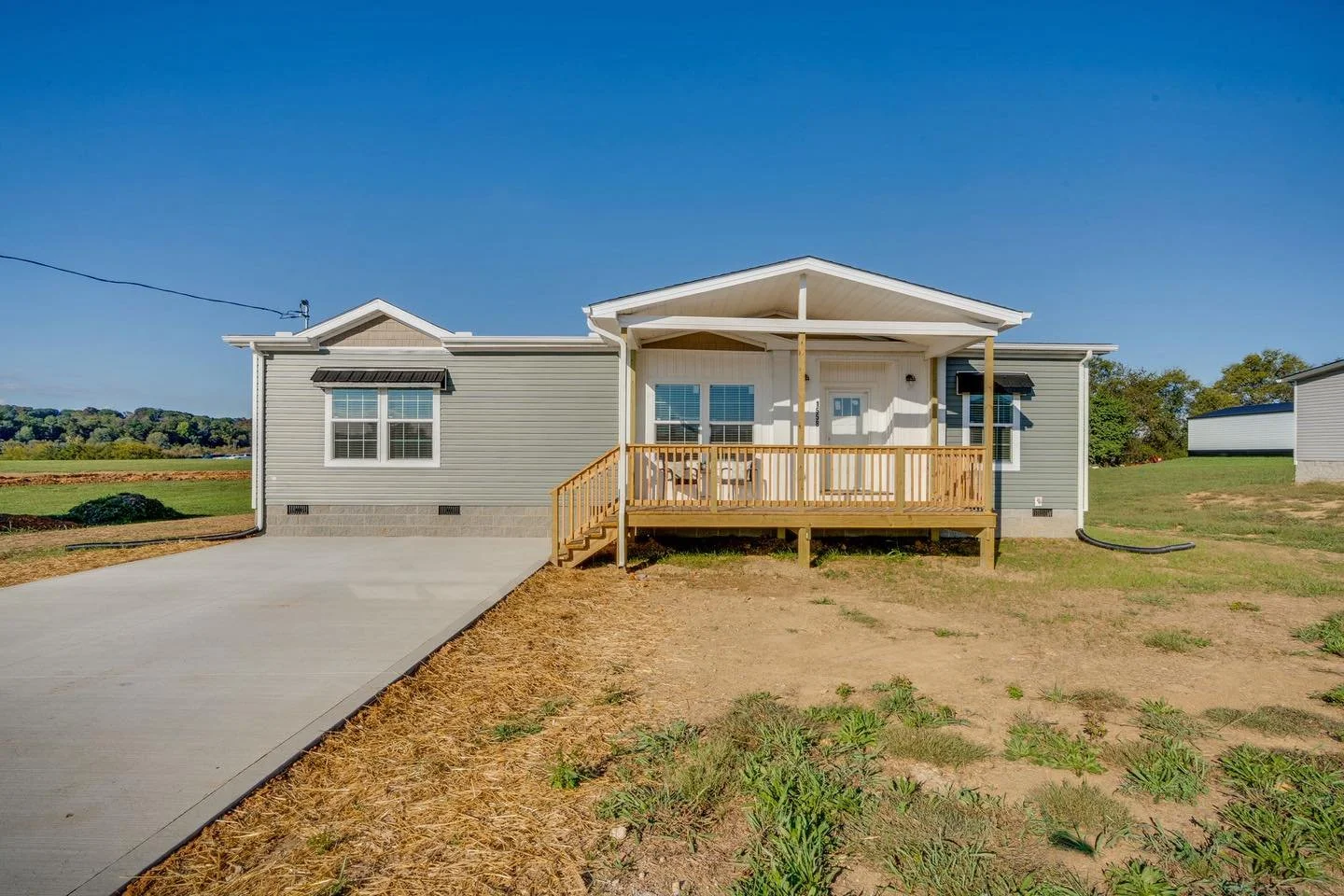 ✨ N E W  L I S T I N G ✨

❗️Shares Appreciated ❗️

Enjoy peaceful living in Spencer on the River with this 3-bedroom, 2-bath home on a large, flat lot. Featuring pastoral views, a covered front porch, and decorative window awnings, this home blends f