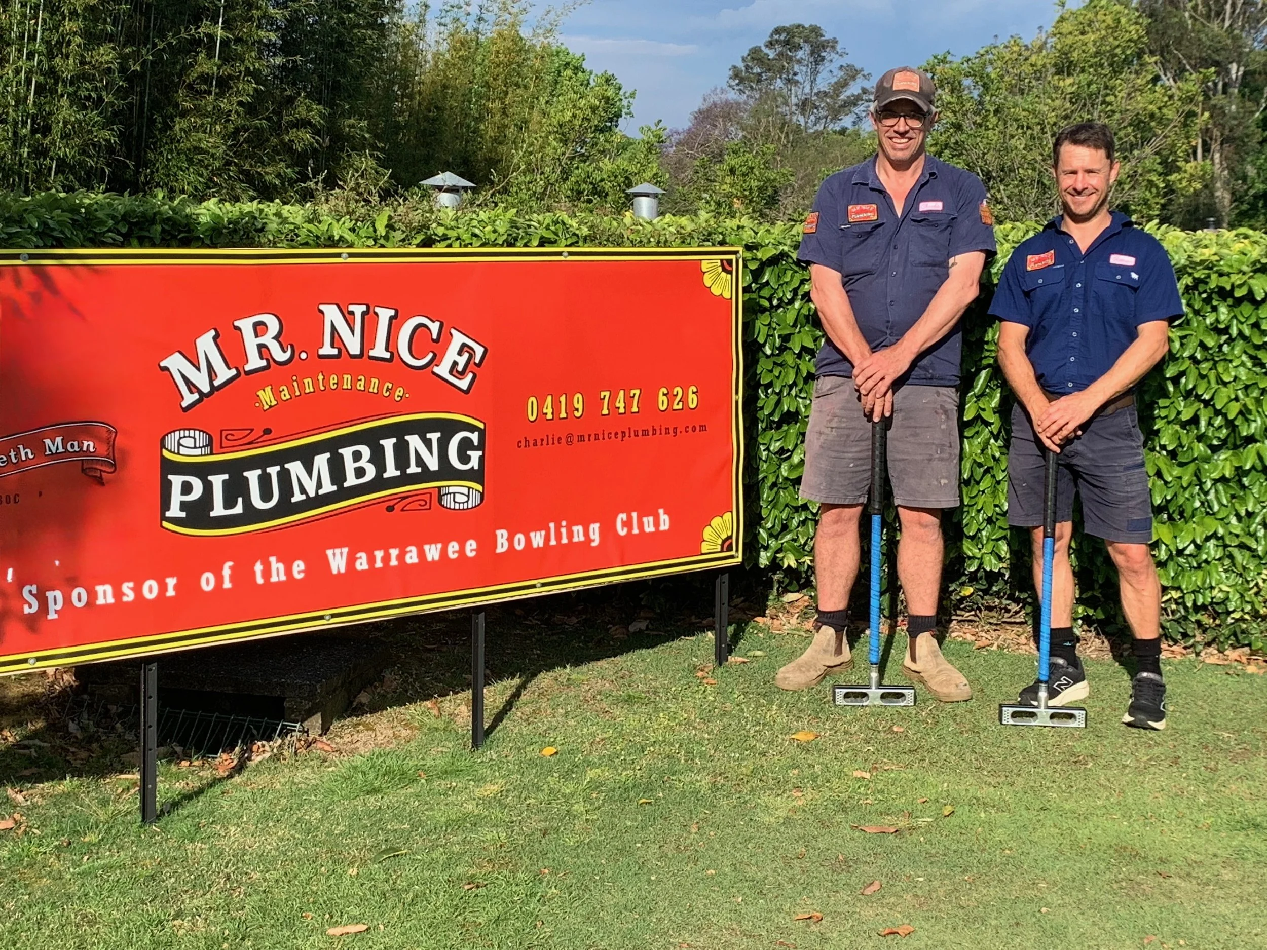 2025 Mr Nice Plumbers- Charlie and Rowan on the croquet lawn