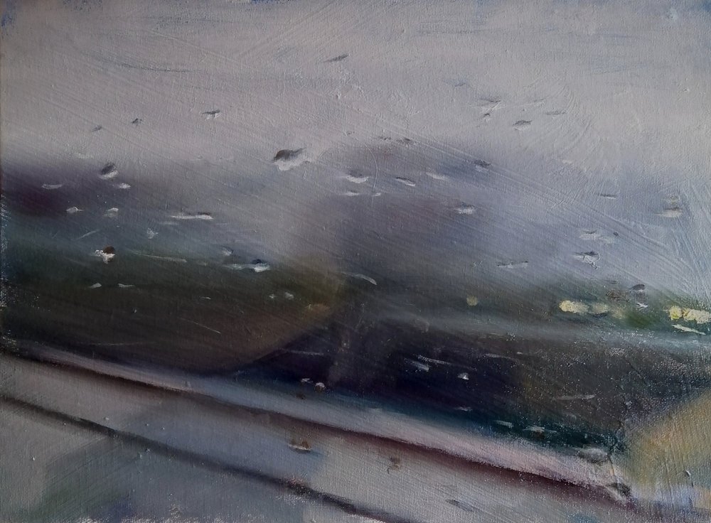 Train through rain  40x30cm  Oil on board  SOLD  A blurred distant landscape seen through rain on a train window. This painting gives us several layers of vision - the rain drops running  across the window, denoting the speed of the train, subtle re