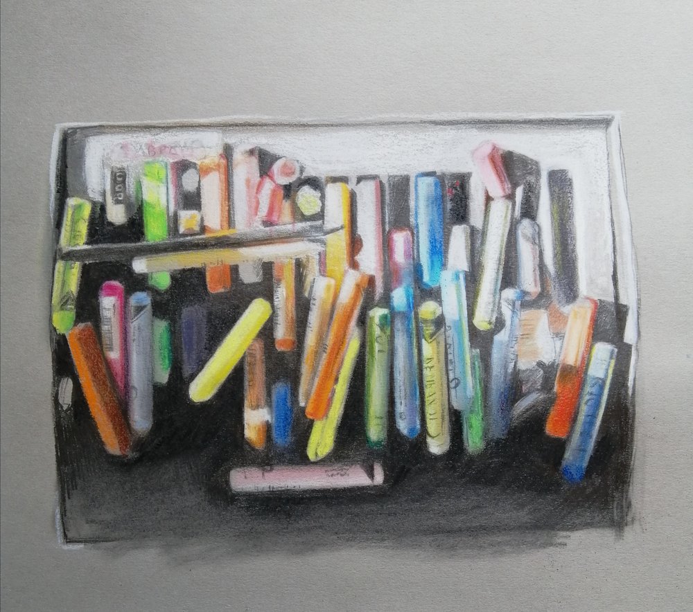  Pastels and pencils  Pastel, pencil and charcoal  £350  A colourful drawing in pastels and pencils, of the pastels and pencils used to draw them. Playful in concept, and aesthetically pleasing due to the rainbow of colours, and a shaft of sunlight w