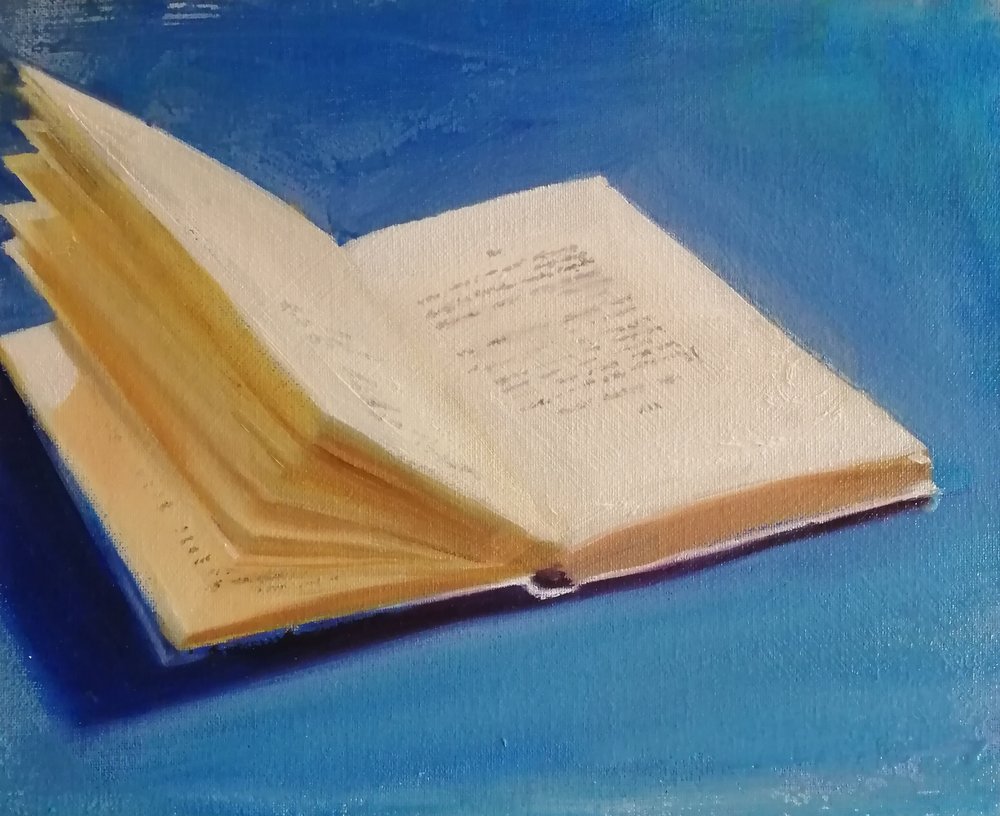  Words on a page  Oil on board  31x26cm  £400  A still life painting of an open book; the soft feathery effect of the yellowed open pages is described with subtle tones and deep shadow gives weight and context to the object. The perfect artwork for a