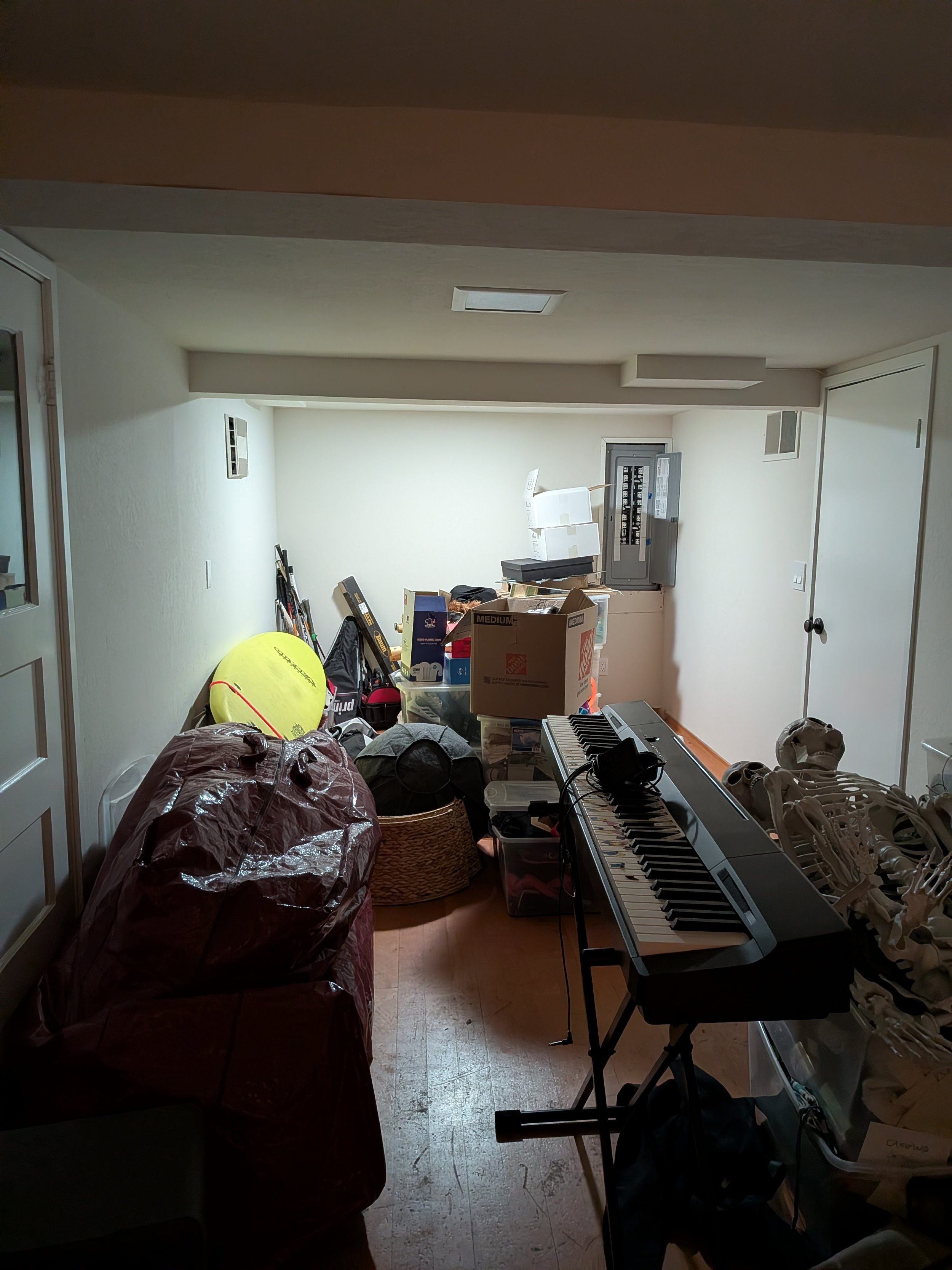 Cluttered "Before" Basement