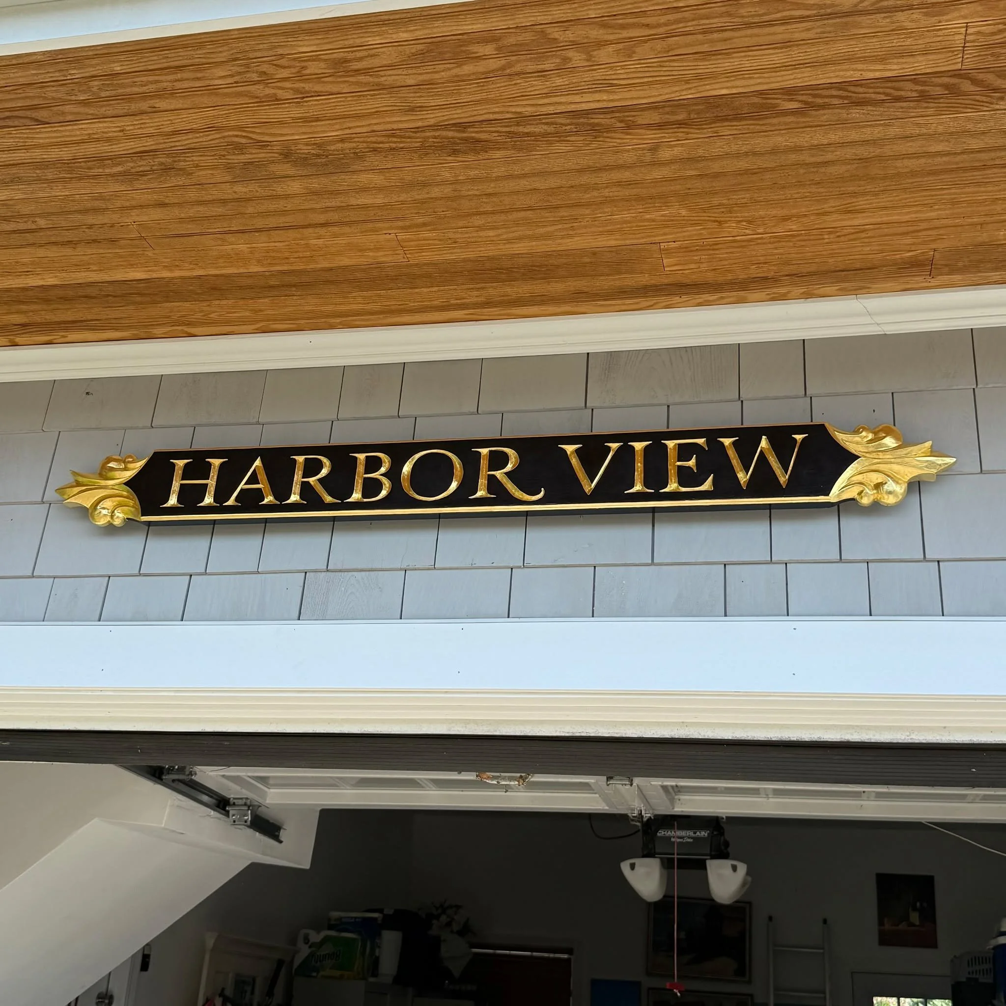 Quarterboard style house signs are a coastal New England tradition. Here is a matched pair of hand-carved boards with floral ends, gilded in 23k goldleaf. DM to  inquire about ordering. 
 #coastalnewengland #scituatema #coastallivingmagazine #neweng