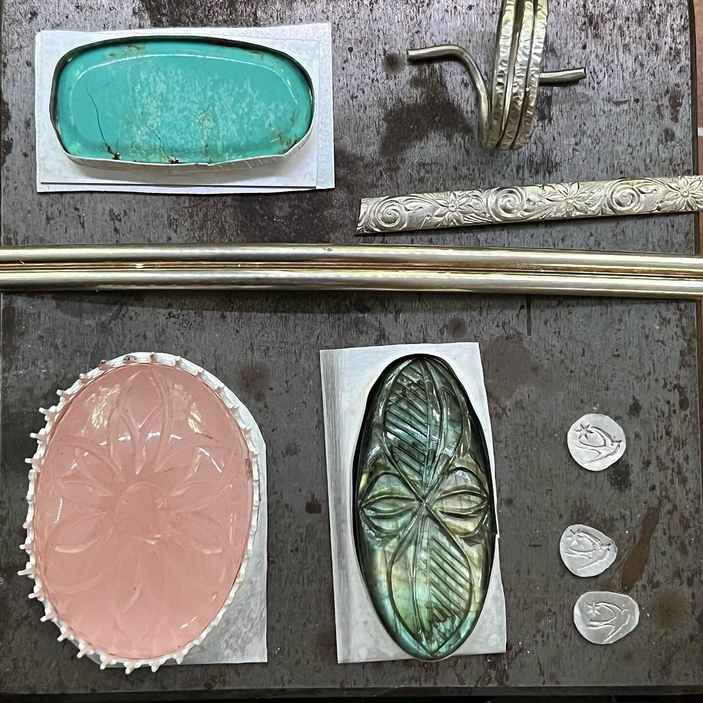 Flat lay rings, with a bonus necklace.

#kosmickistudio #ladysmith #onmybench #wip #flatlay #madeinatlanta #statementrings