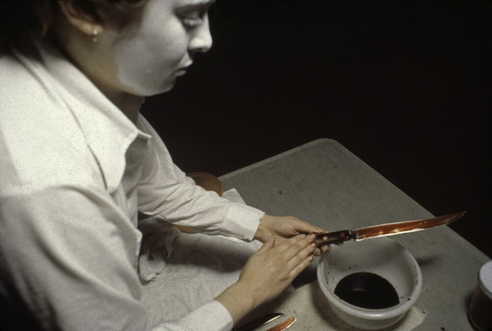 Betsy Damon, What Do You Think About Knives?, performance at the University of Rhode Island Student Union, Kingston, RI, April 28, 1980.