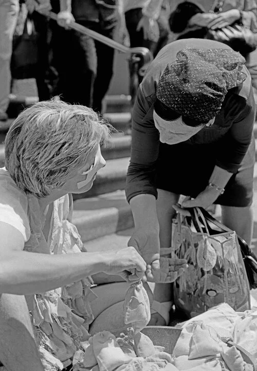 Betsy Damon, Blind Beggarwoman, performance in front of St. Patrick's Cathedral, New York, June 15, 1979.