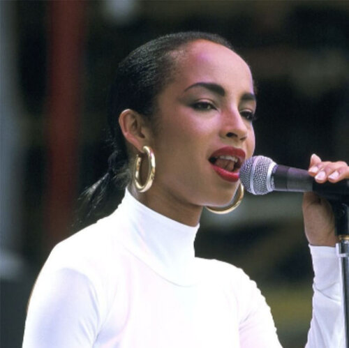Sade, wearing her iconic gold hoops, 2012