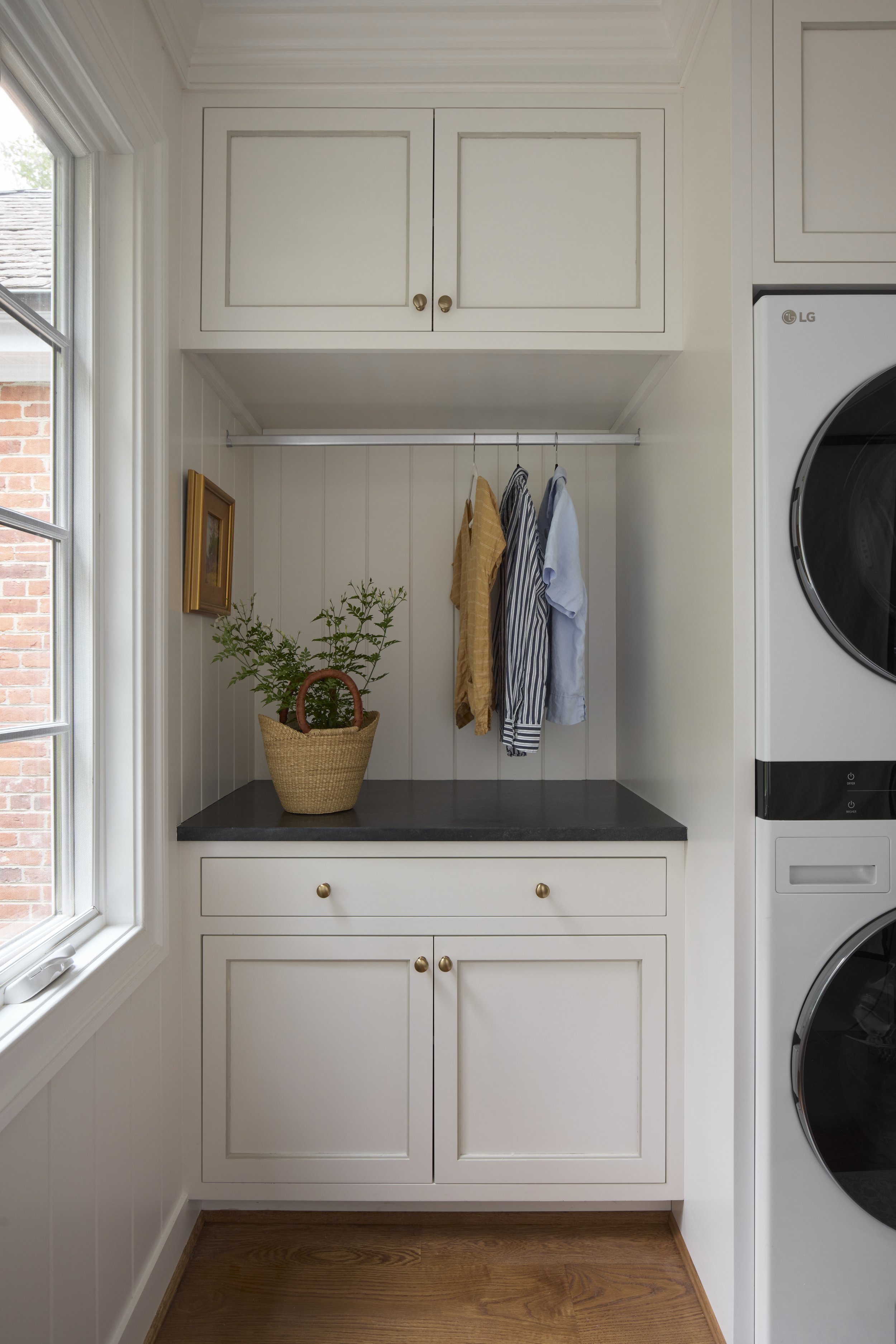 Bespoke Laundry Room, Custom Cabinetry, stacking washer/dryer. LG Stacker