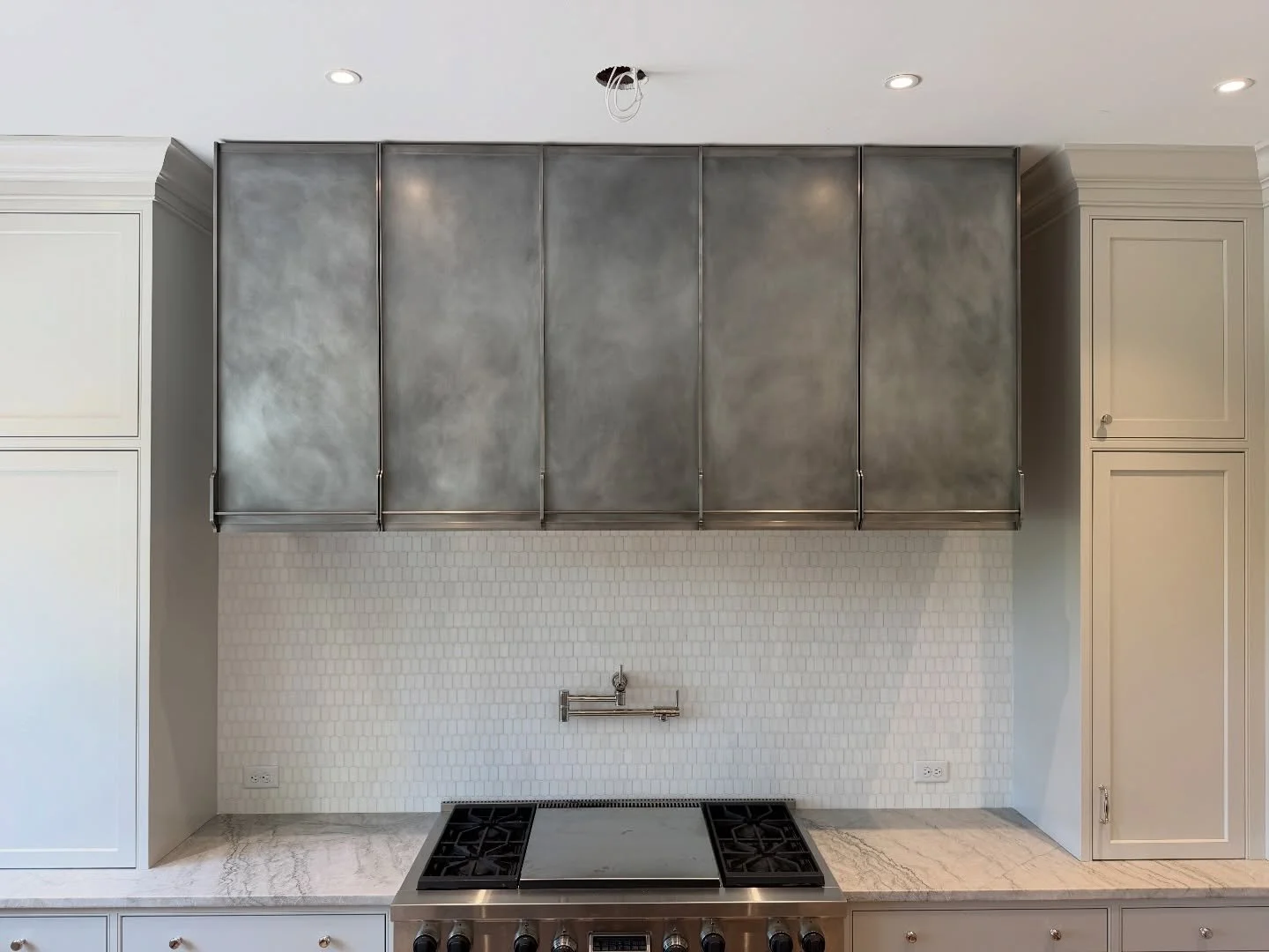 Well, this might just be the most beautiful hood we&rsquo;ve ever designed.  Our client wanted to maximize storage in her kitchen and we both wanted a killer hood to align with the design. Enter @bruindesign, who took our concepts and drawings, worke