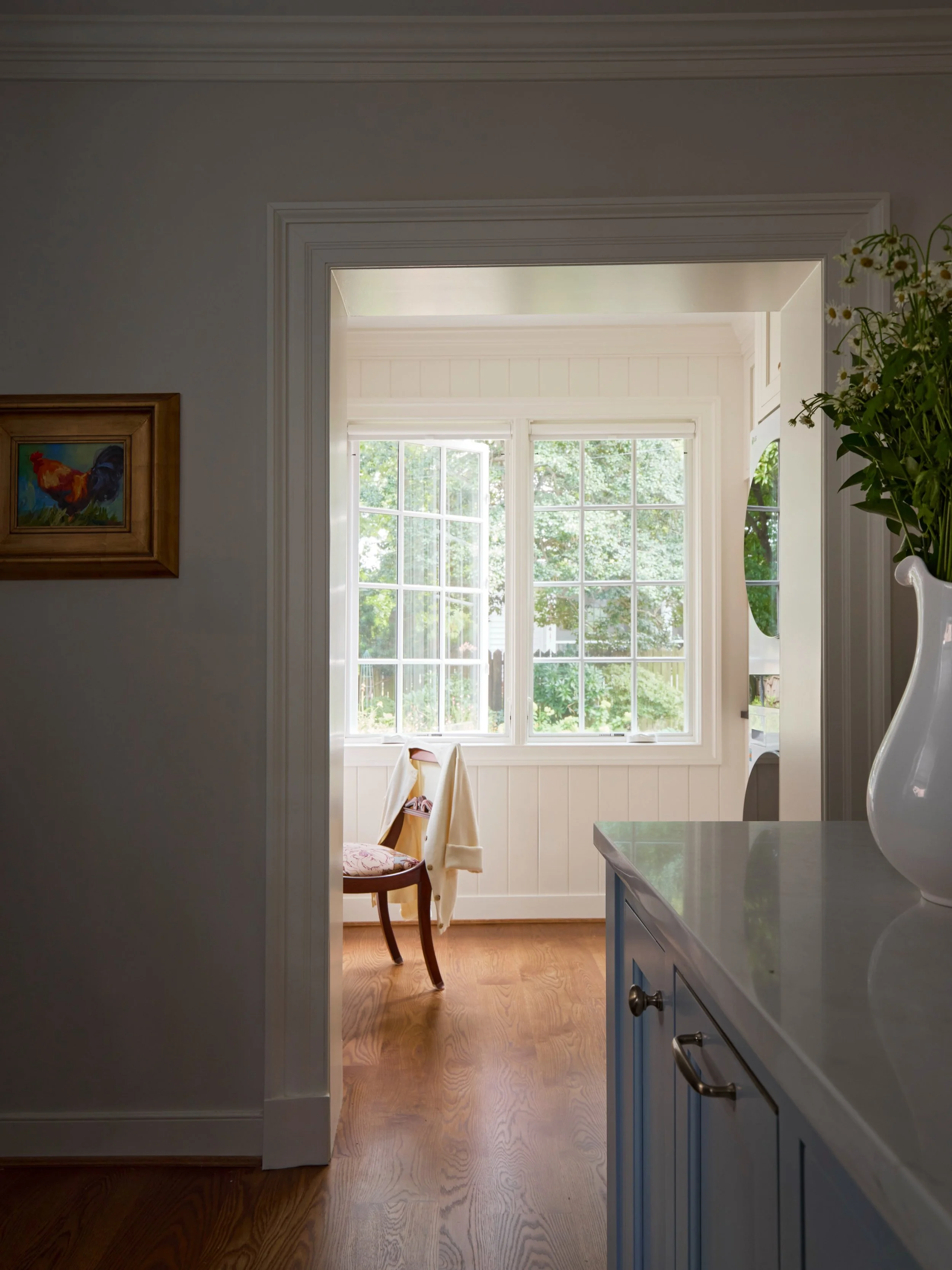 90 additional square feet was all our client needed to make her house complete.  What I love most about what this addition did for the home was support three additional functions without sacrificing sunlight.  When cabinetry is designed with intentio