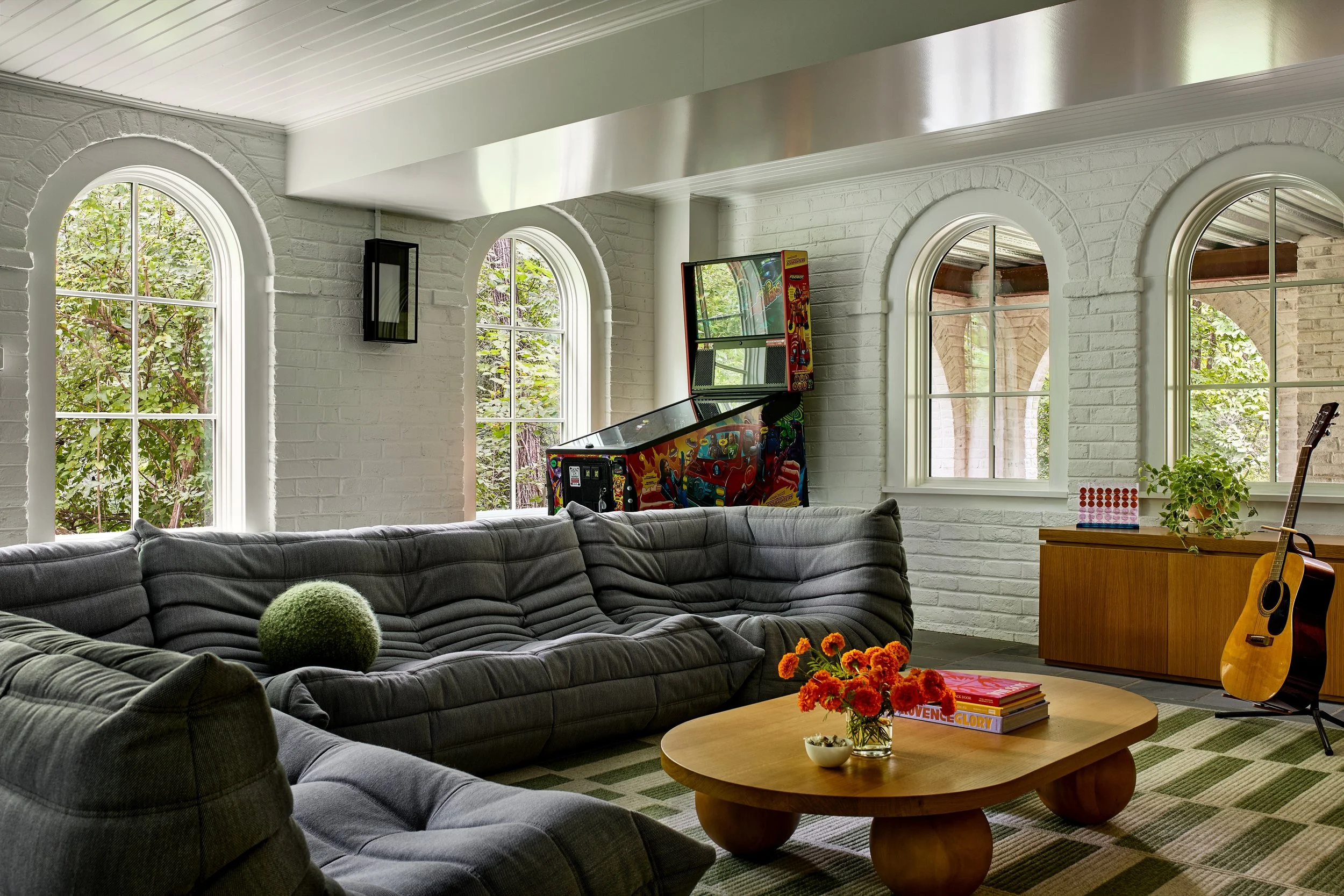 Kids Hang space, custom rug, ligne roset togo furniture lower level space, custom millwork