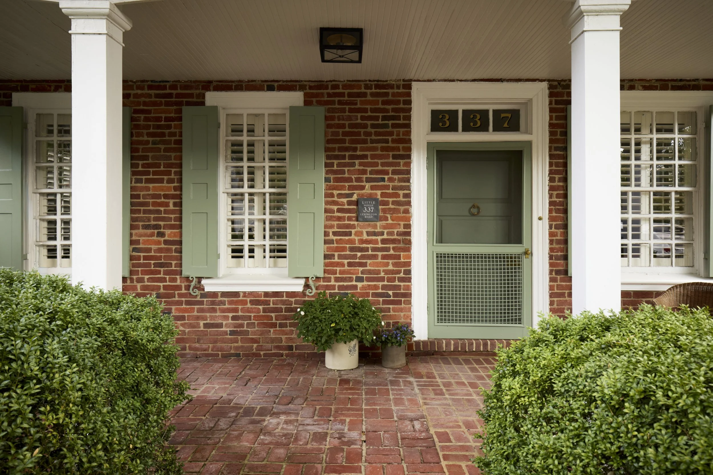 Historic Home in Richmond VA, original brick, custom shutters, green front door