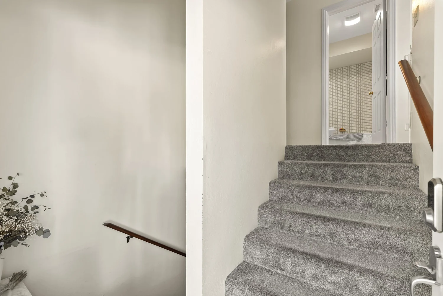 Interior staircase in the front home