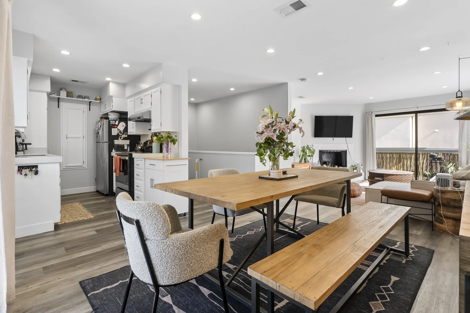 Open dining, kitchen and living area in the rear home