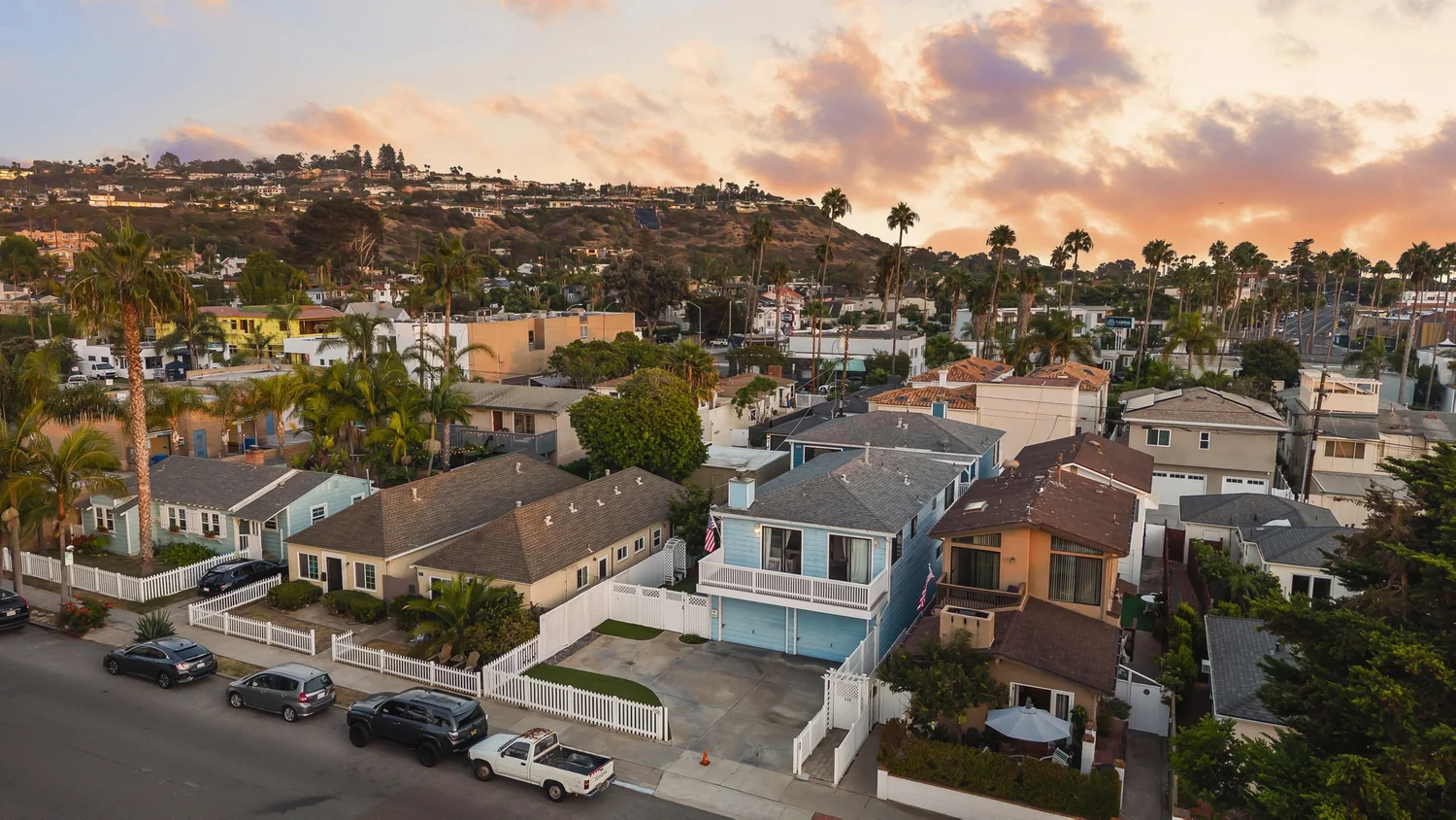 Aerial of the property and Nautilus St at sunset