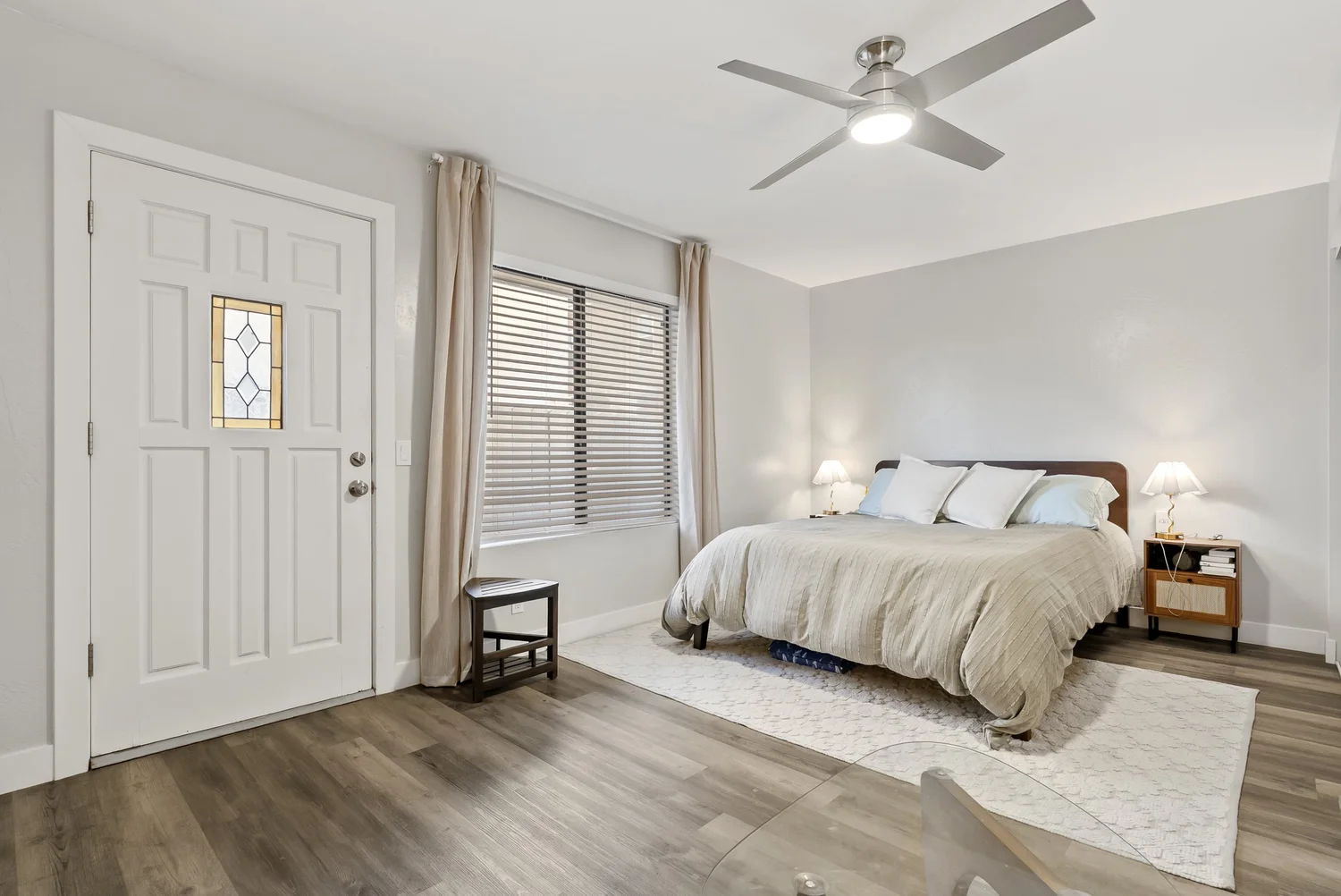 Bedroom with king bed and ceiling fan
