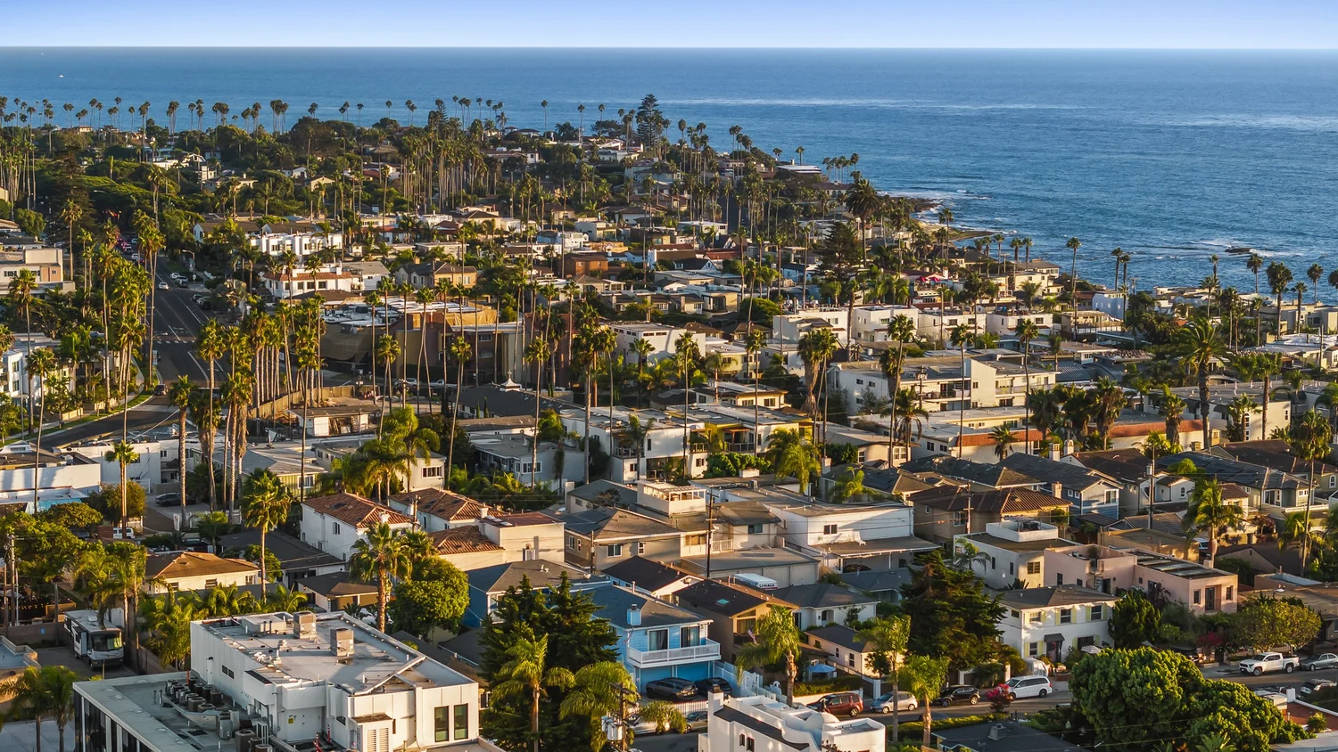Aerial view over La Jolla's Barber Tract toward the Pacific, looking across the neighborhood around 429–433 Nautilus St near Windansea Beach