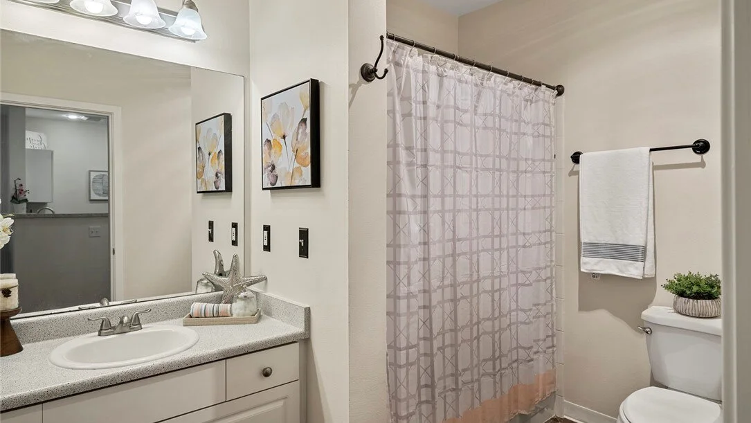 interior of bathroom with white countertops
