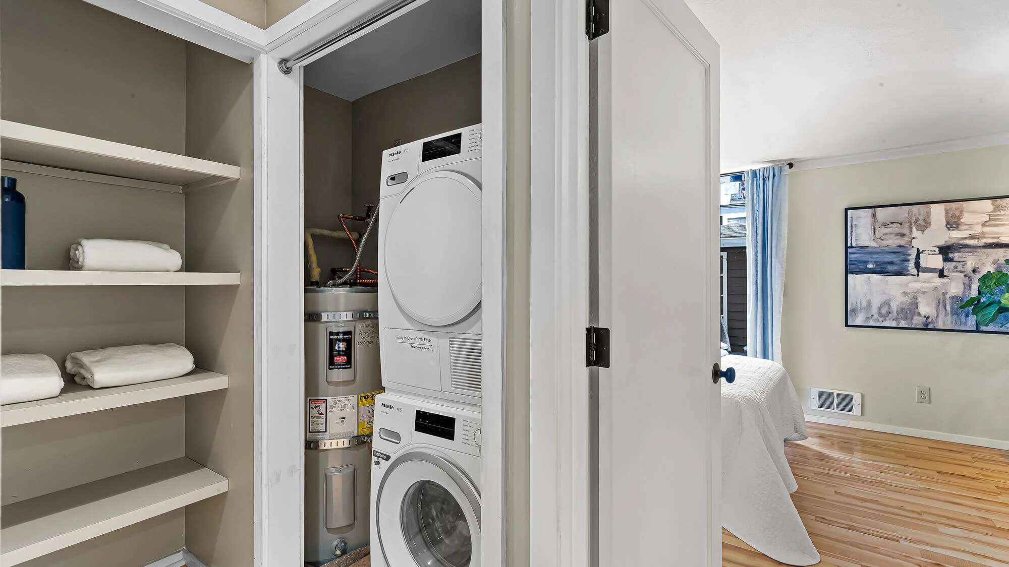 interior of storage closet with washer and dryer