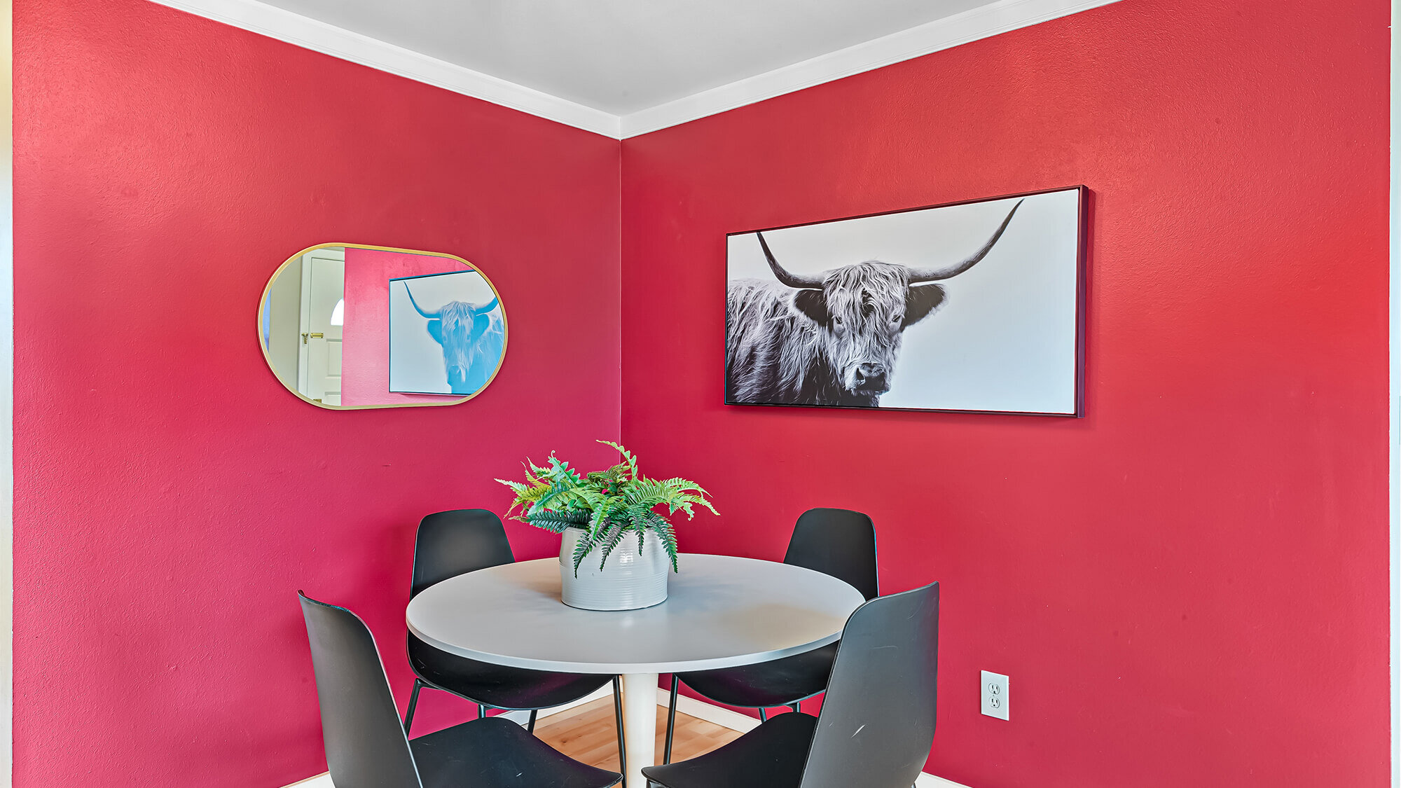 interior of dining area with hardwood floors and  dining table