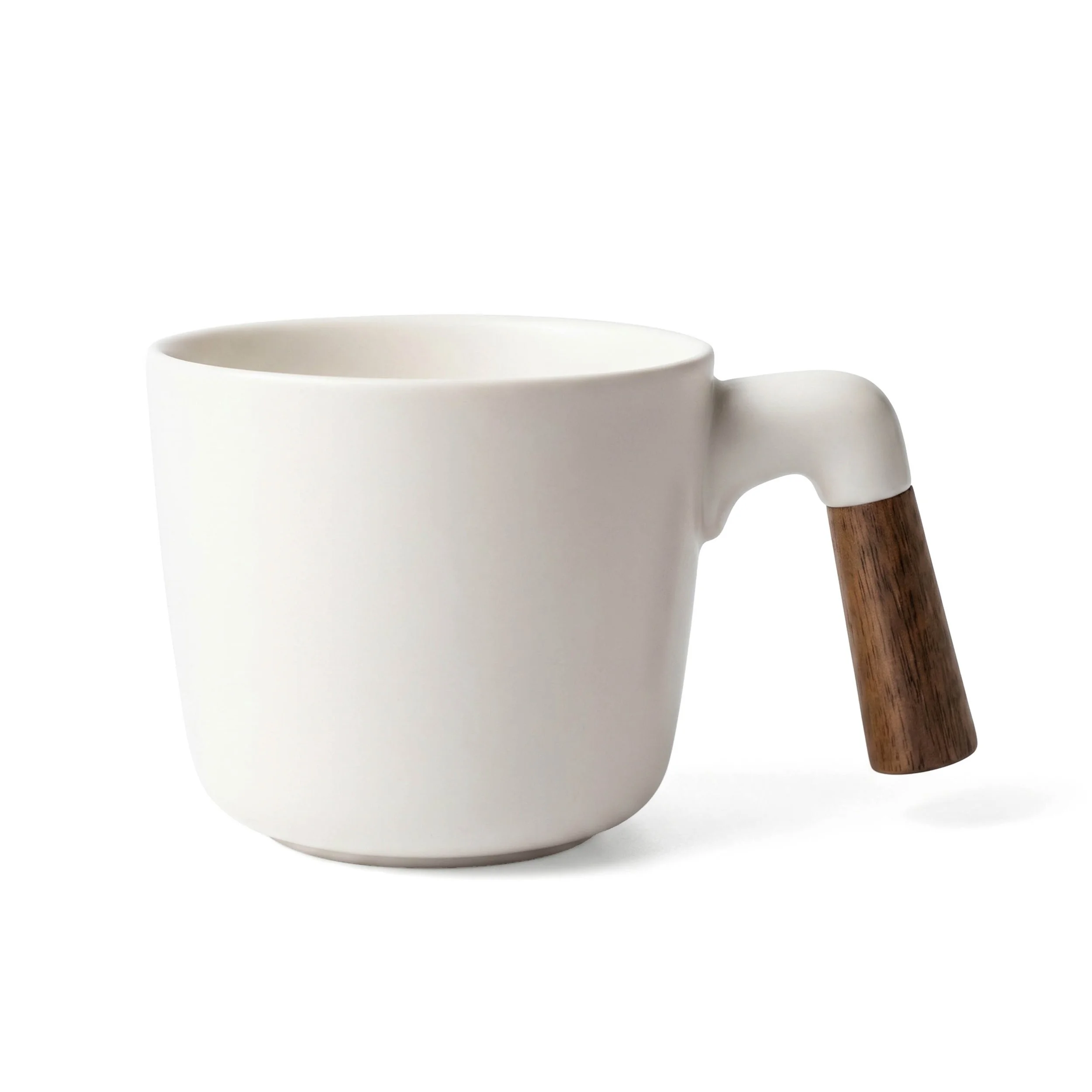 A single stoneware cup shown alone, angled to show the wood handle and its rounded interior.